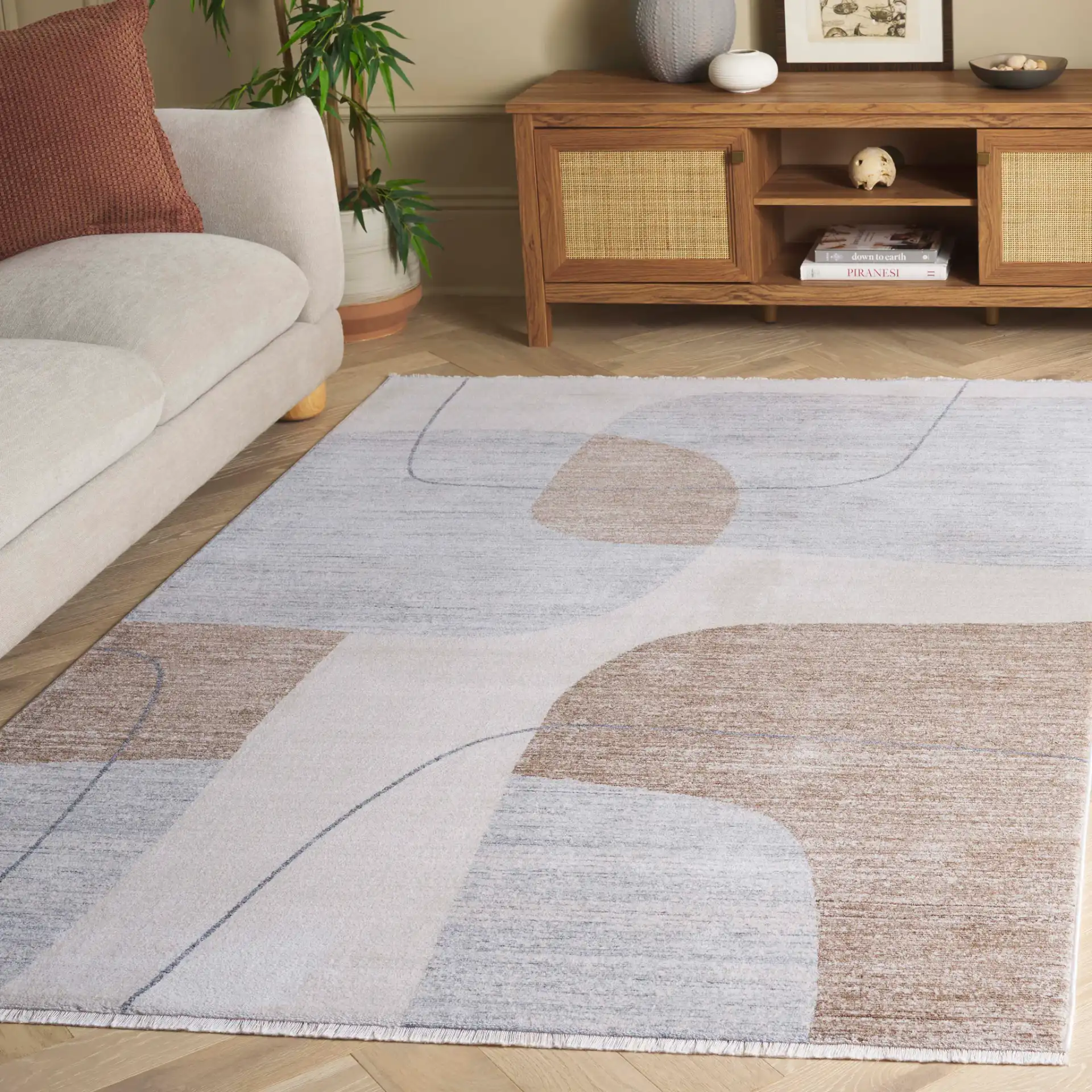 Forum Modern Abstract Rug in Ivory / Gray Brown in a styled room