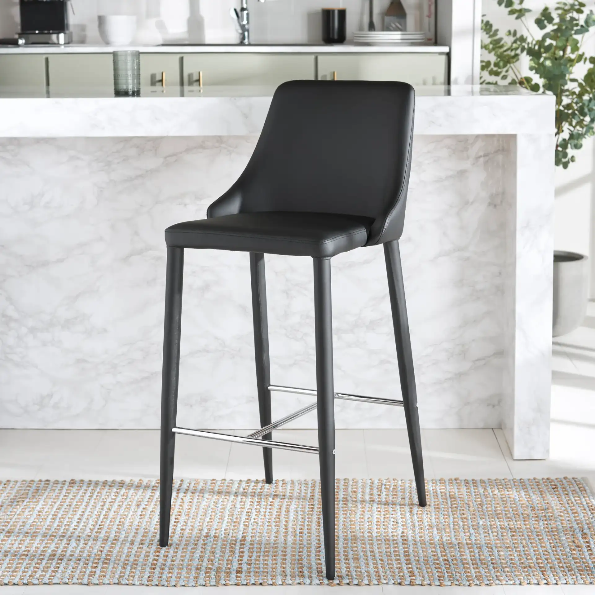 Summerset Bar Stool in Black in a styled room