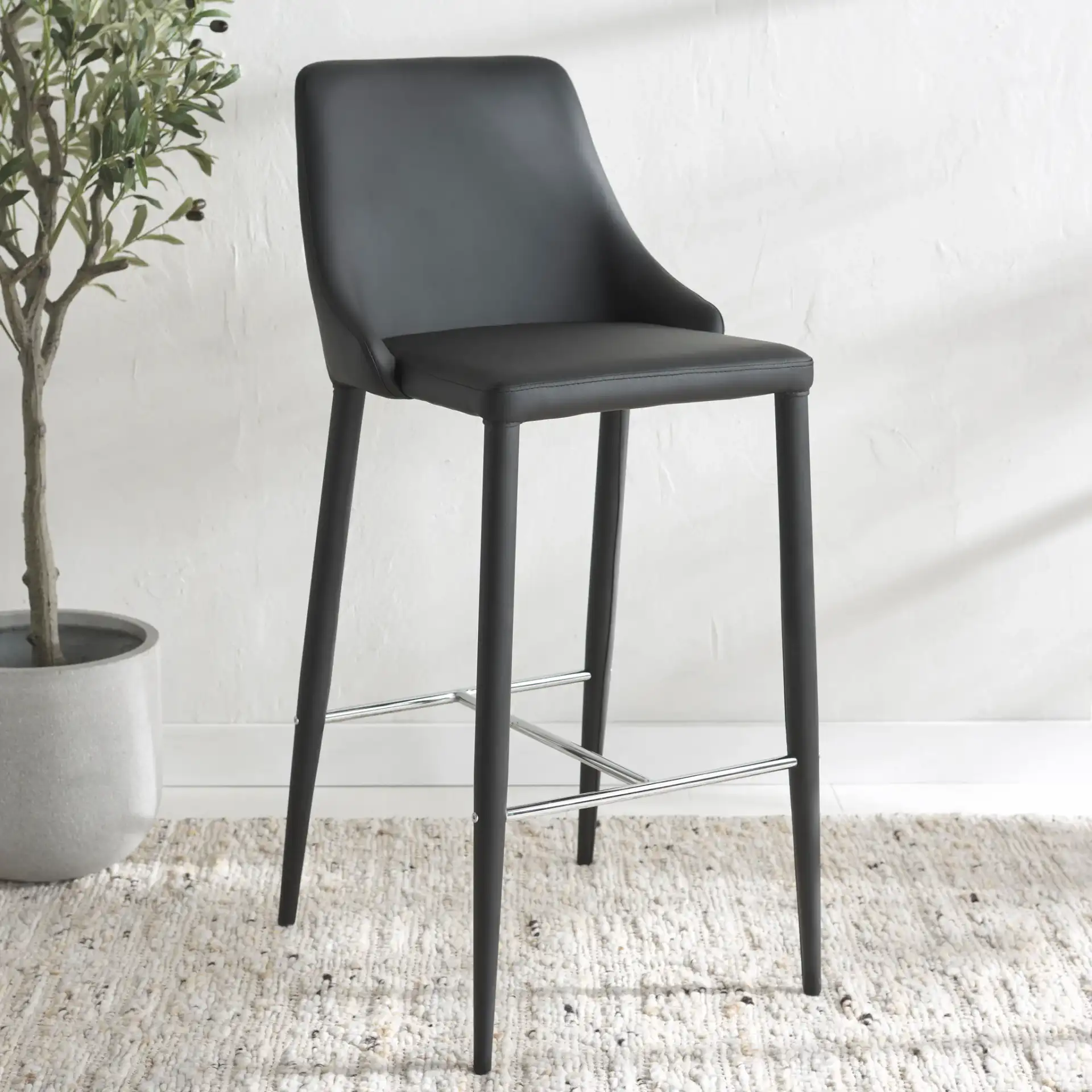 Summerset Bar Stool in Black in a styled room