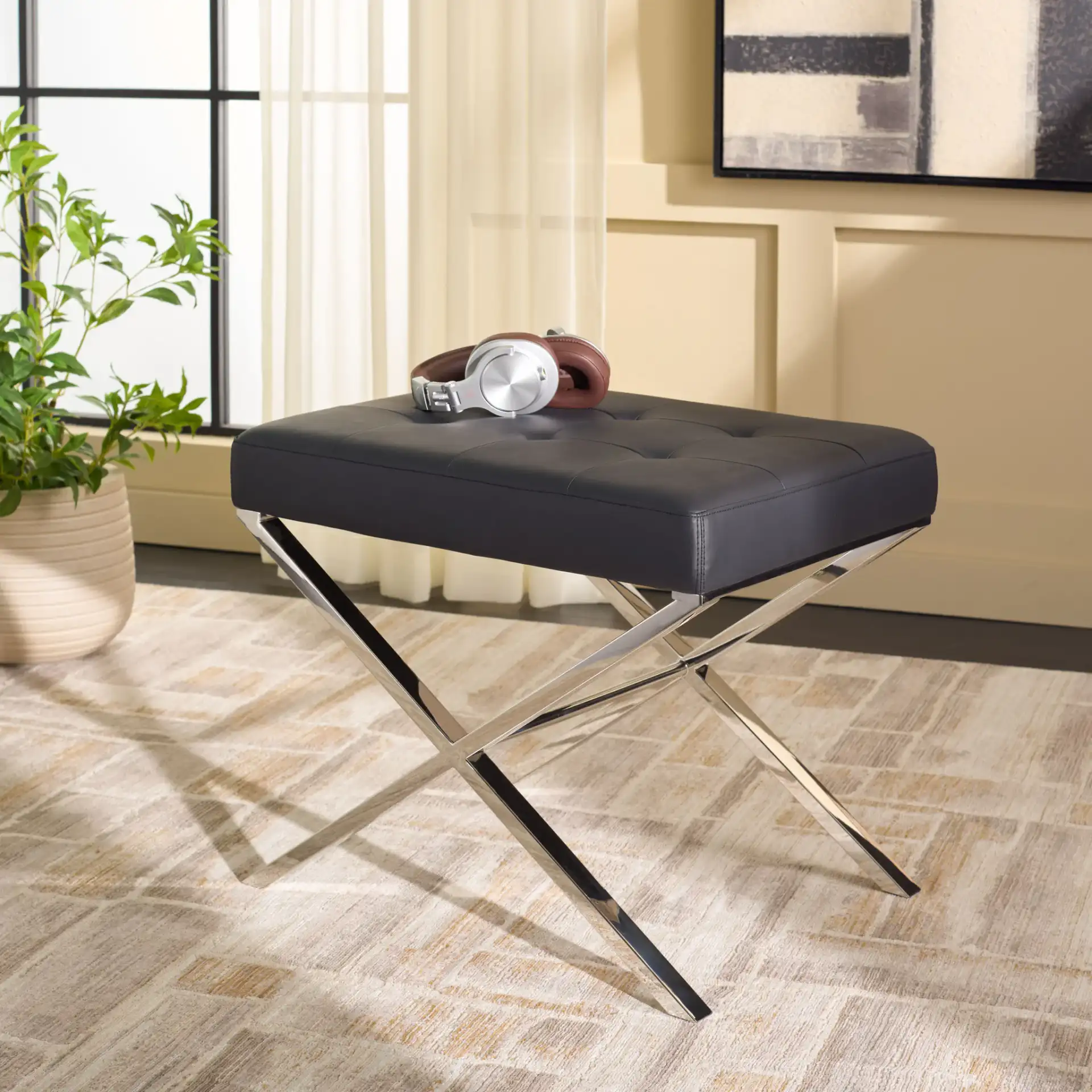 Sienna Ottoman in Black in a styled room