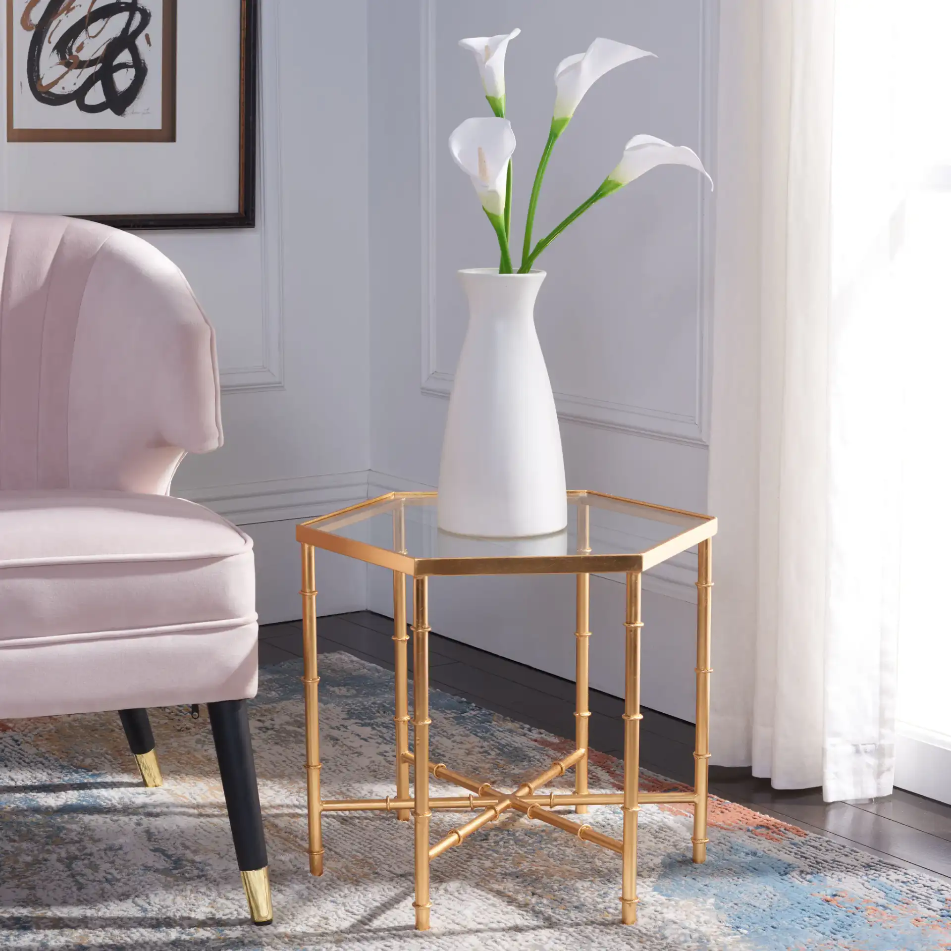 Kerri Accent Table in Gold / Clear in a styled room