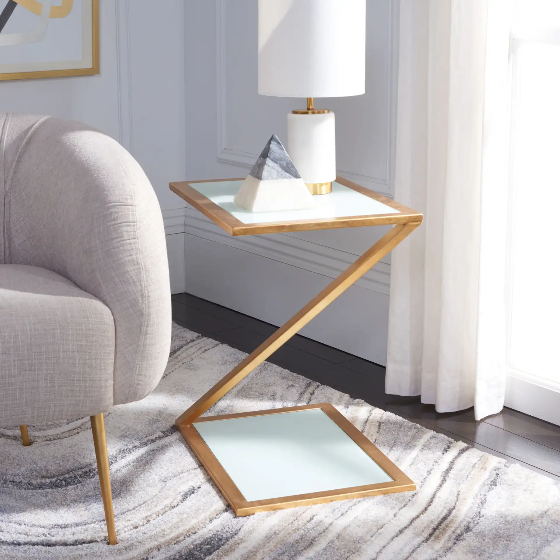 Andrea Accent Table in Gold / White in a styled room