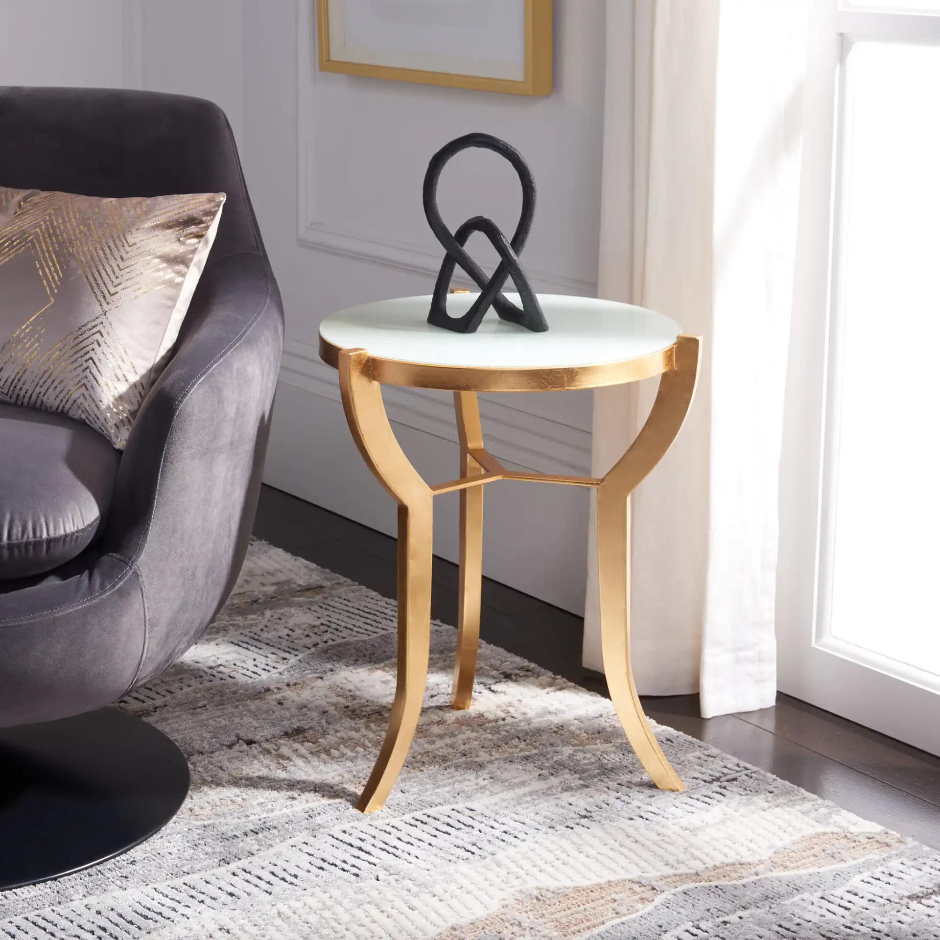 Ormond Accent Table in Gold / White in a styled room