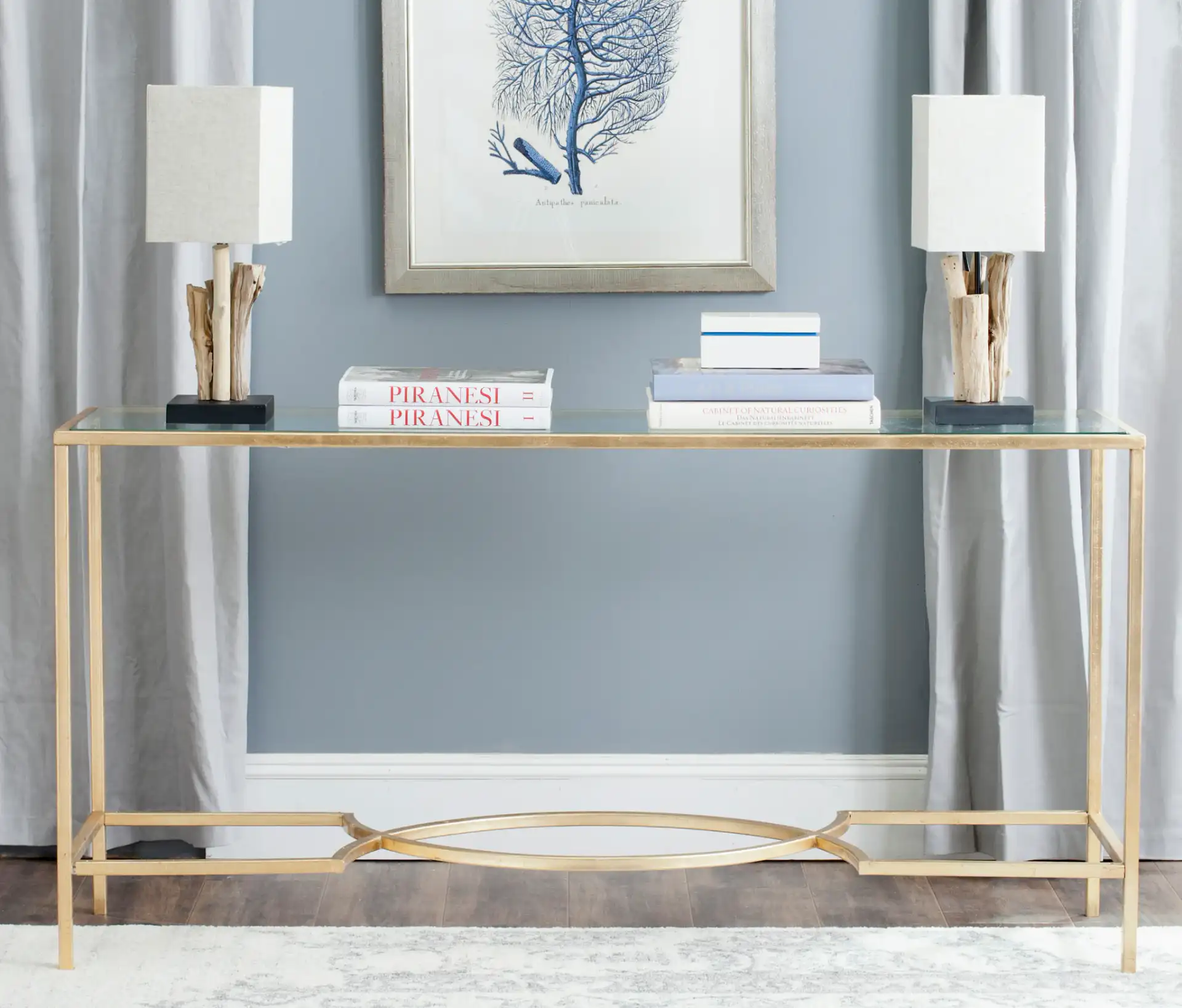 Inga Console in Gold / Clear in a styled room