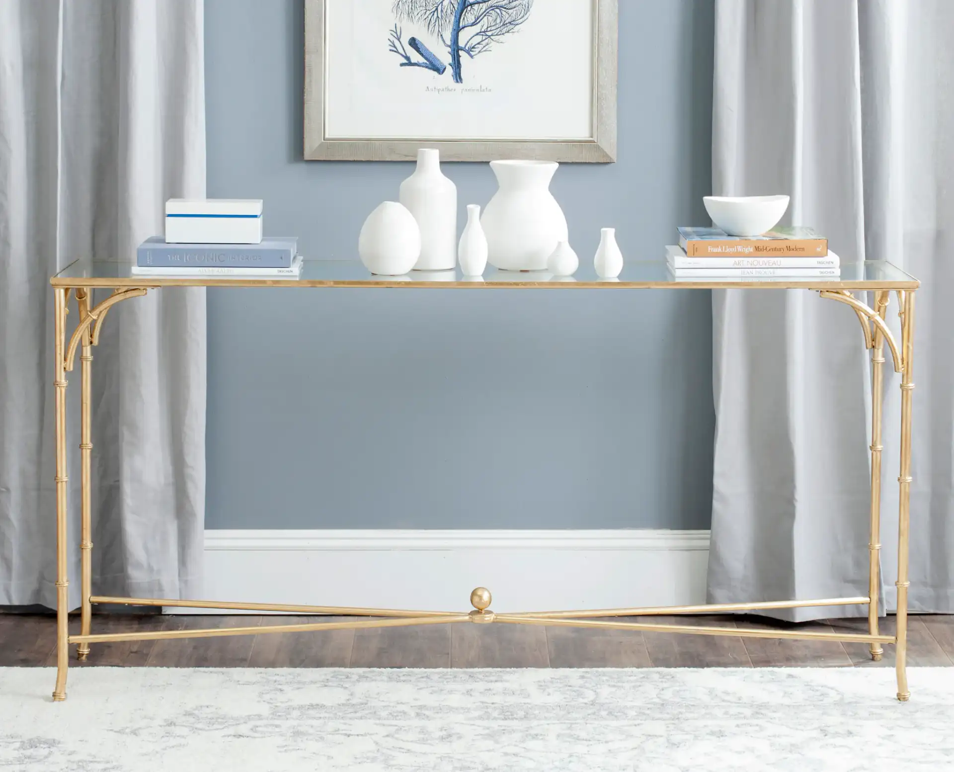 Maurice Console in Gold / Clear in a styled room