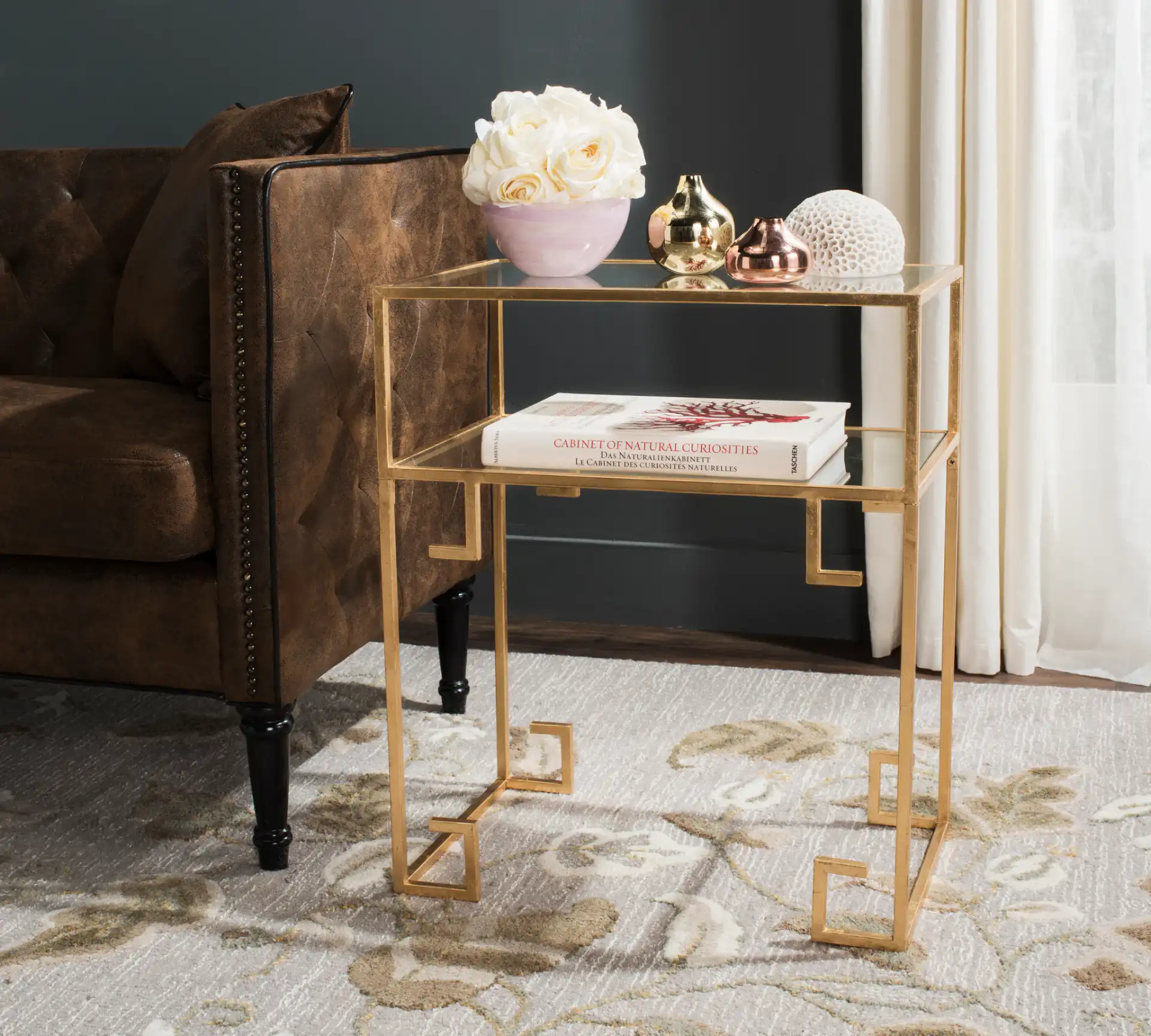 Berdine Accent Table in Gold / Clear in a styled room