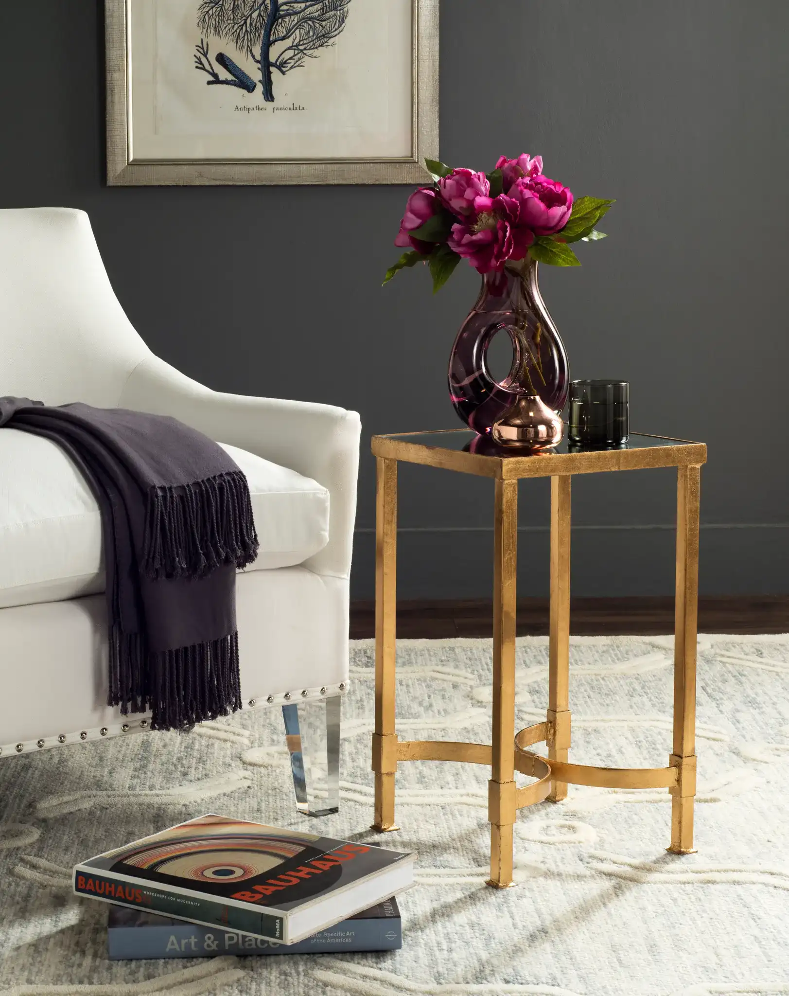 Halyn End Table in Gold in a styled room