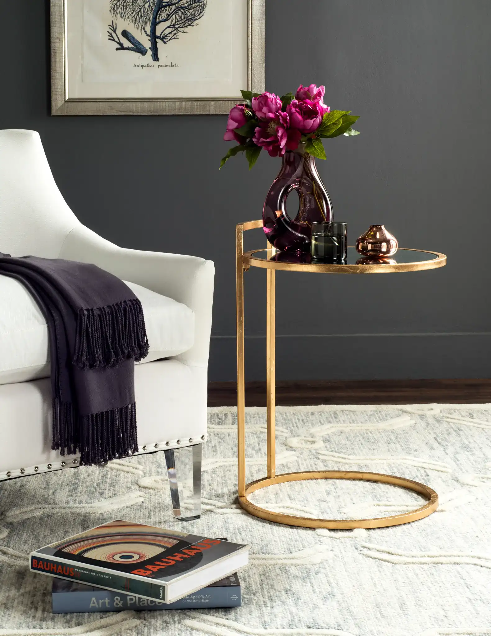 Calvin Round End Table in Gold in a styled room