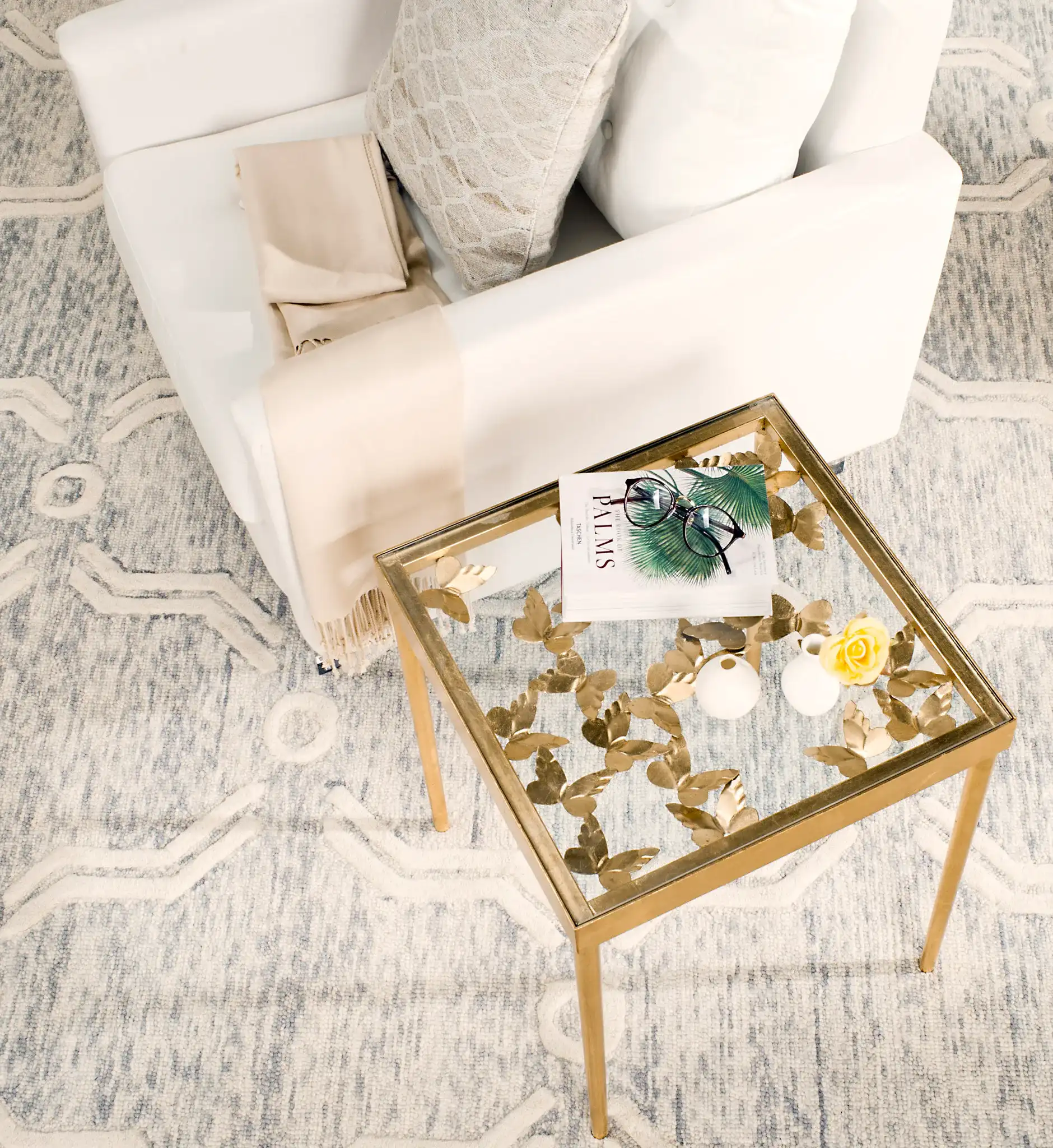 Rosalia Butterfly Side Table in Gold in a styled room
