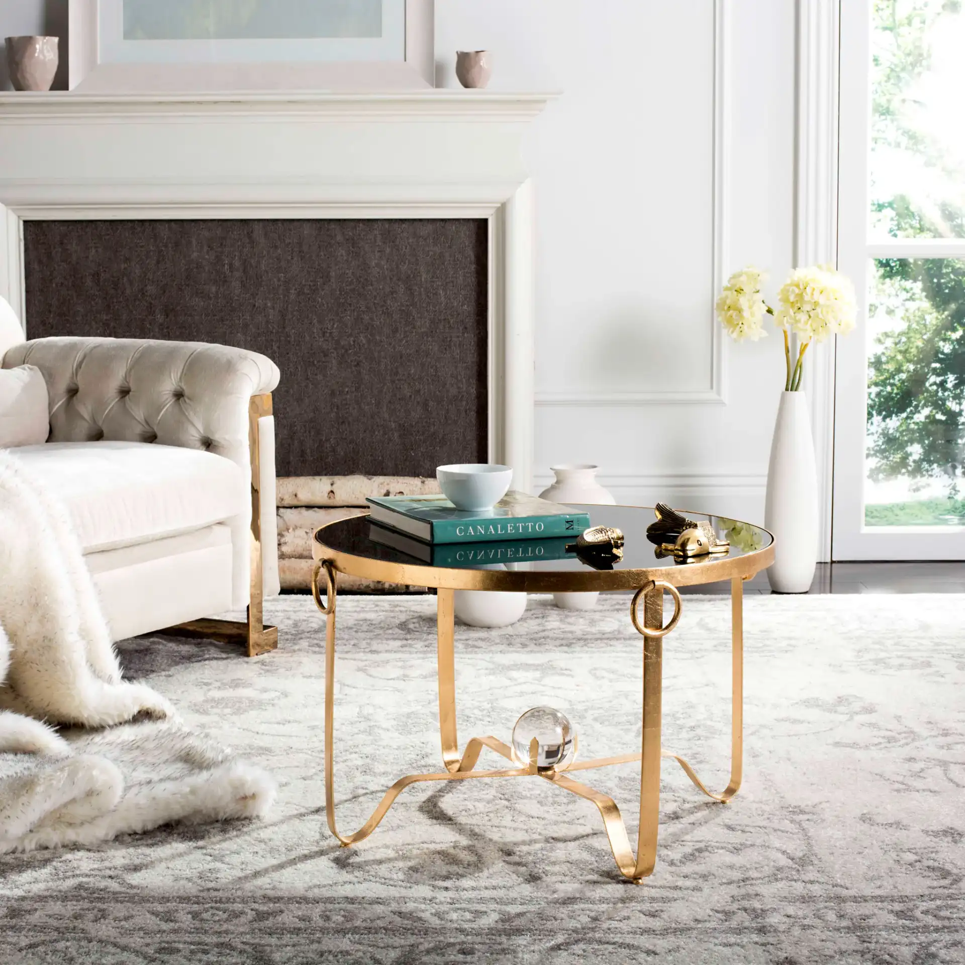 Elisha Accent Table in Gold / Black in a styled room