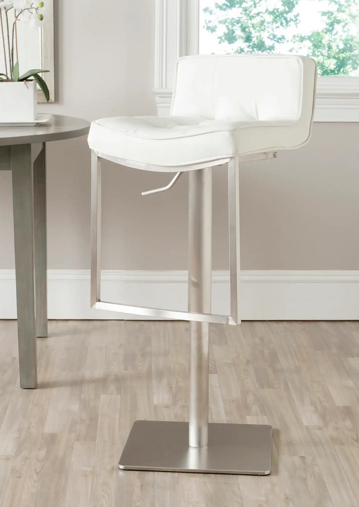 Newman Bar Stool in White in a styled room