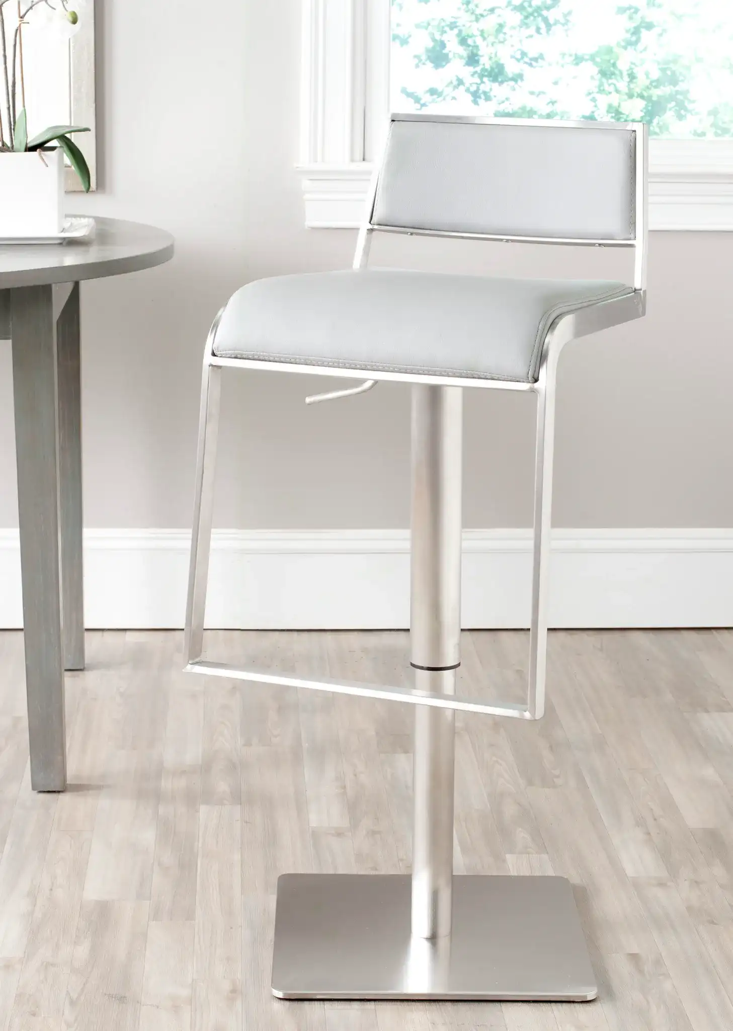 Natania Bar Stool in Gray in a styled room