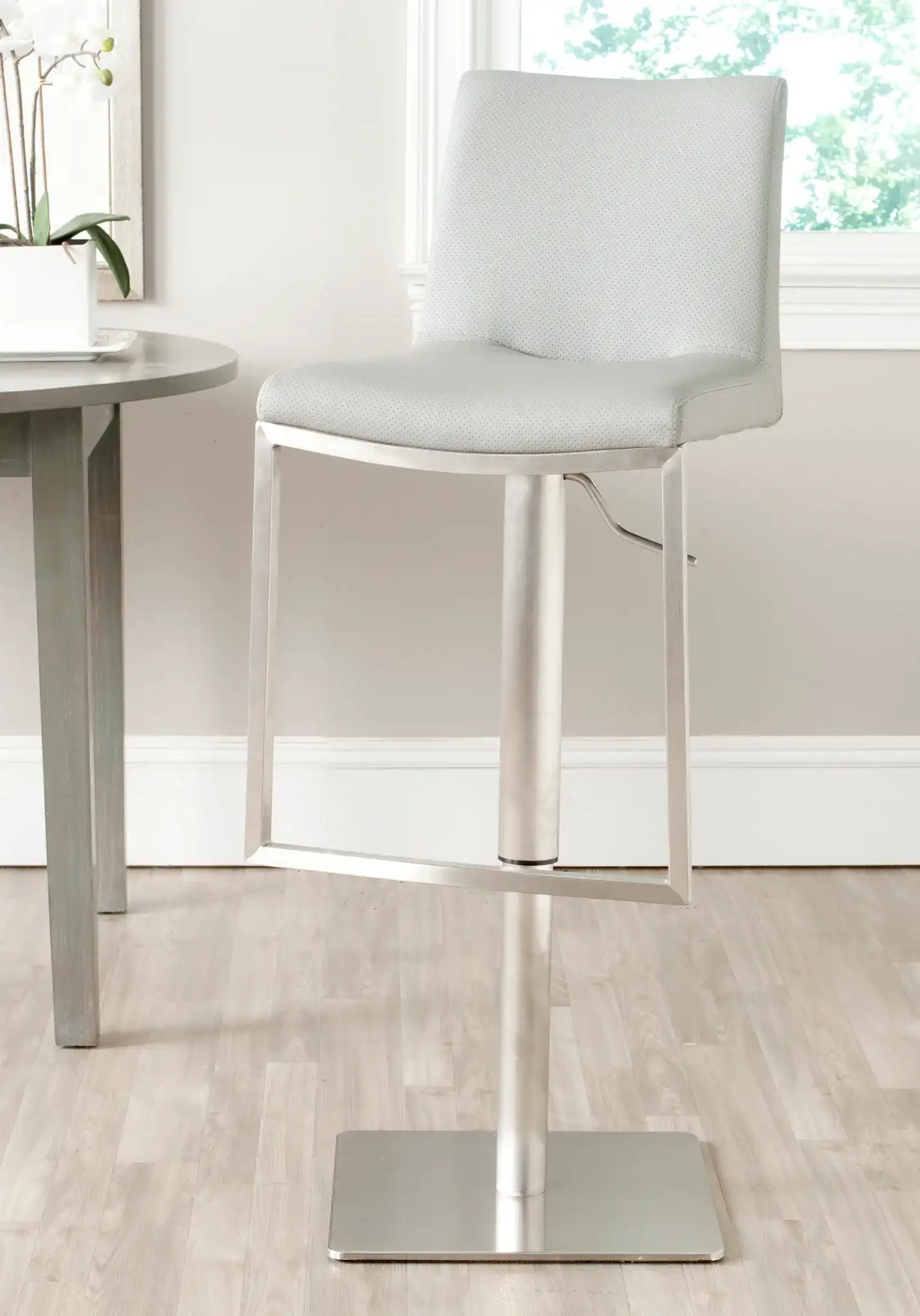 Ember Bar Stool in Gray in a styled room