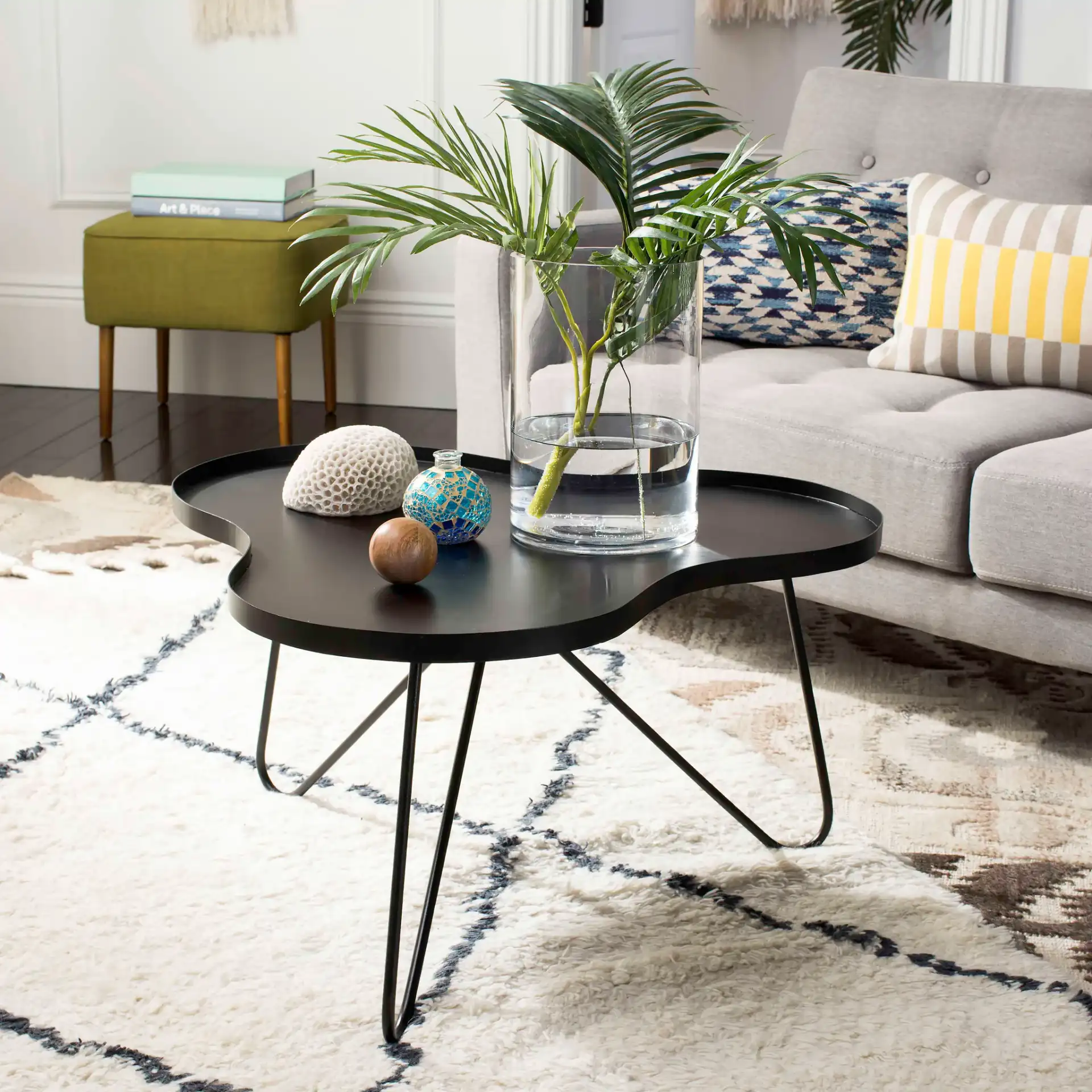 Lenna Coffee Table in Black in a styled room