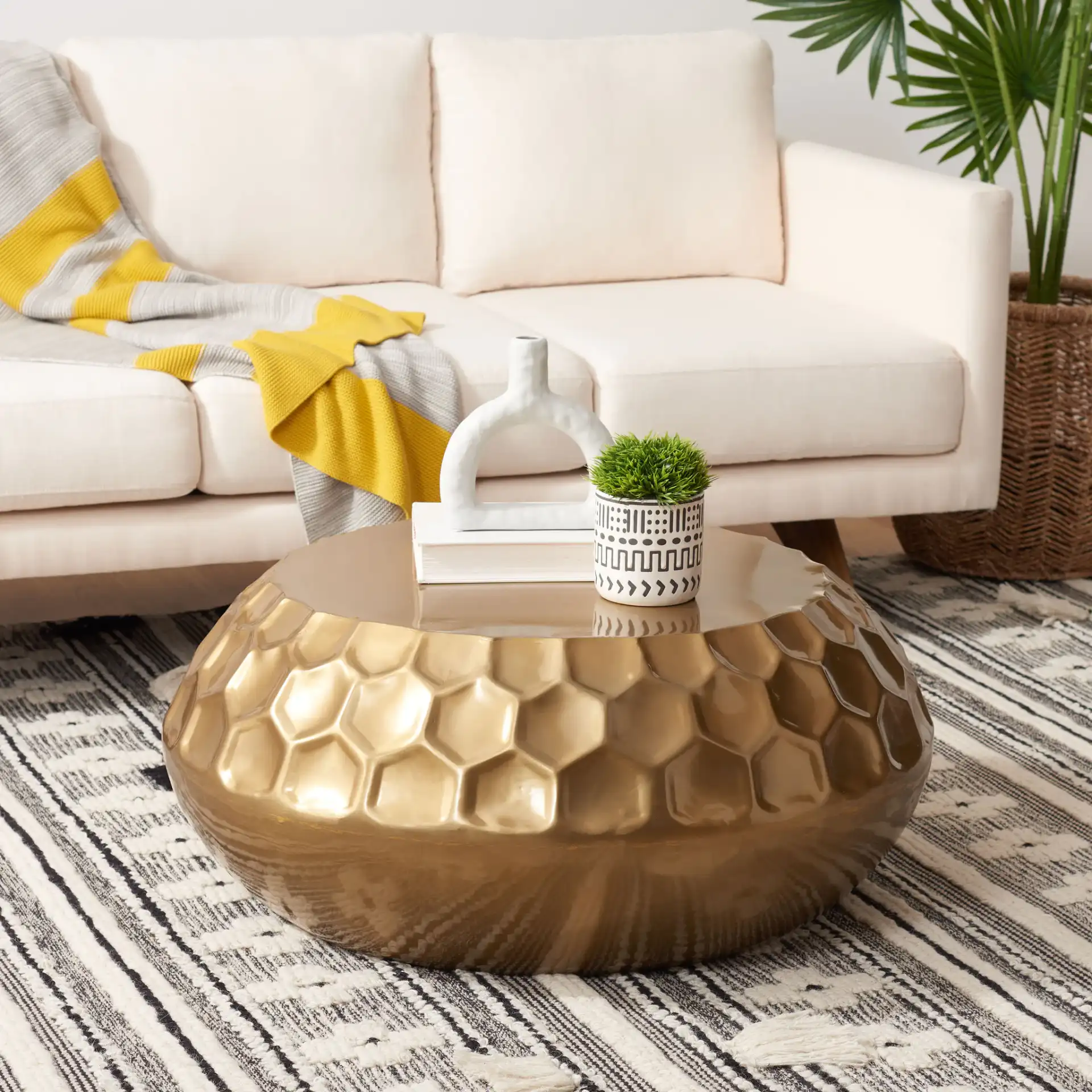 Roxanna Coffee Table in Antique Brass in a styled room