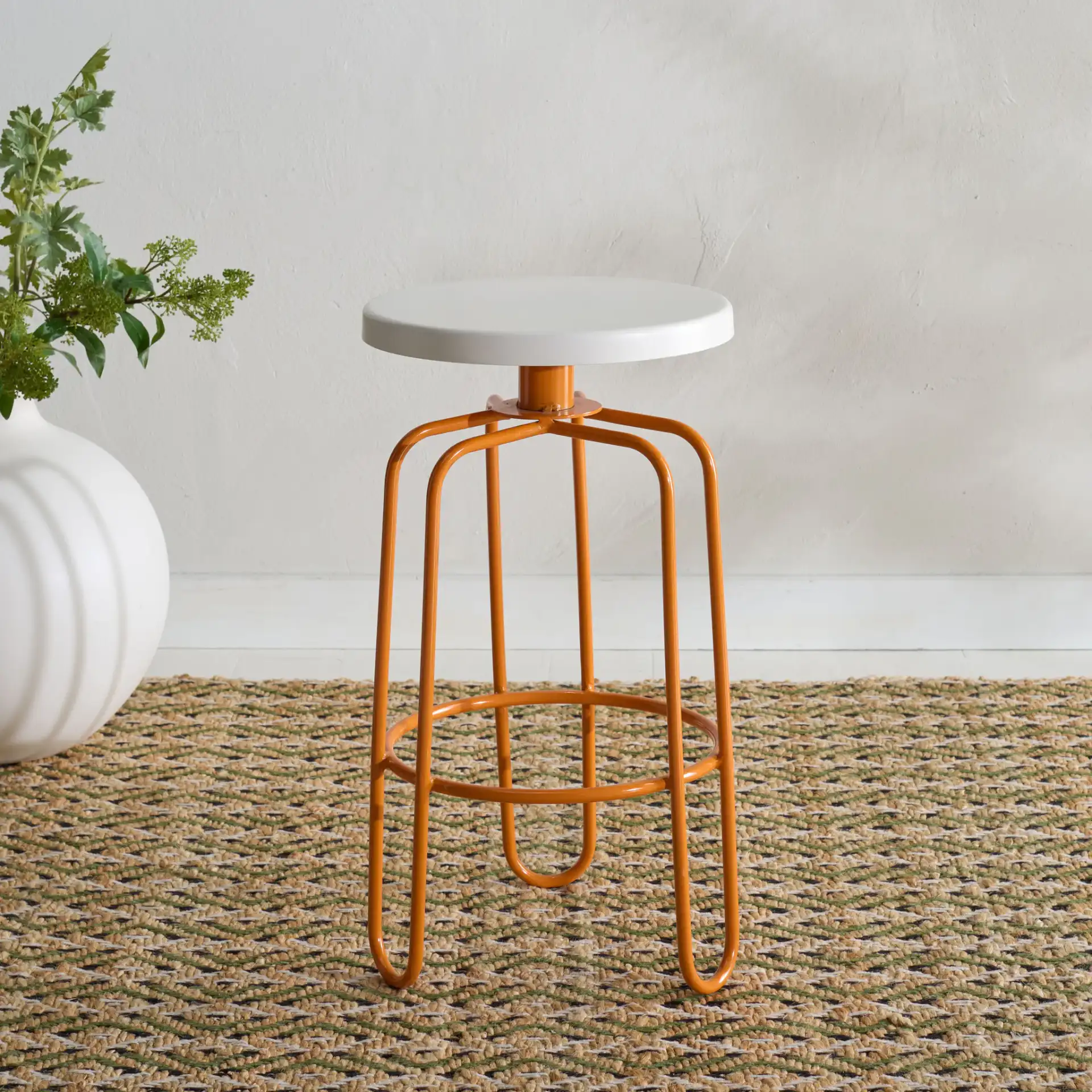 Osamu Counter Stool in Cream / Orange in a styled room