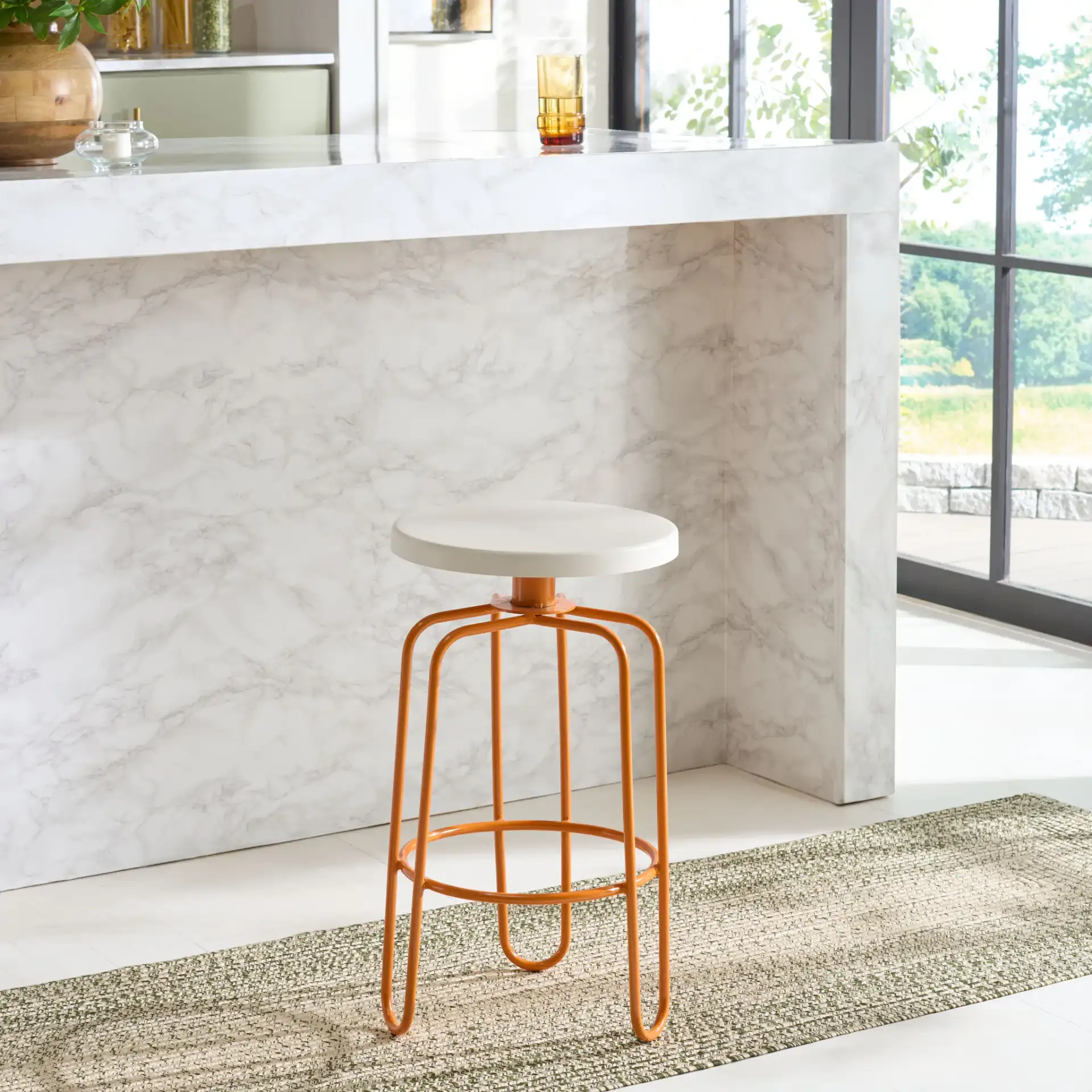 Osamu Counter Stool in Cream / Orange in a styled room
