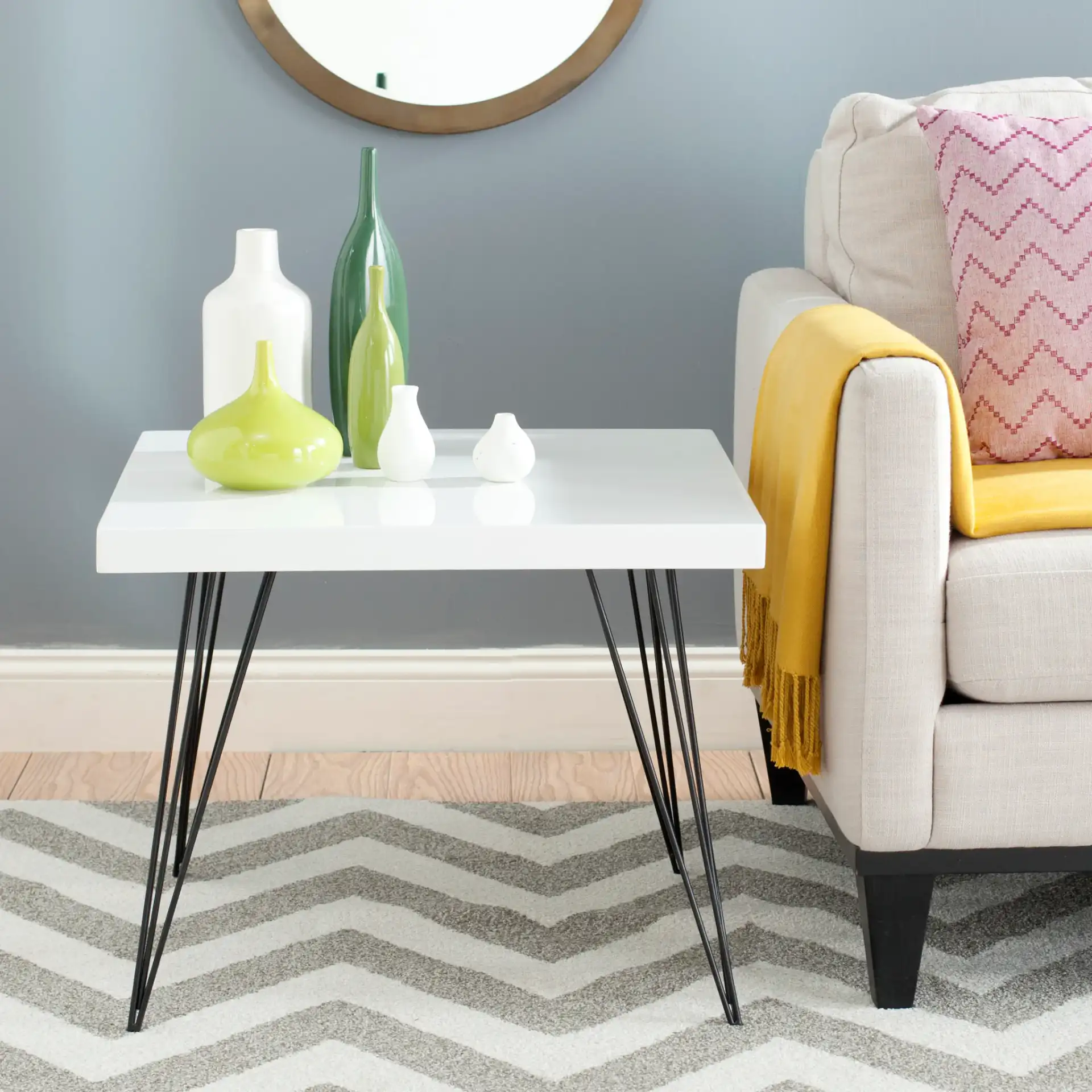 Wolcott End Table in White / Black in a styled room