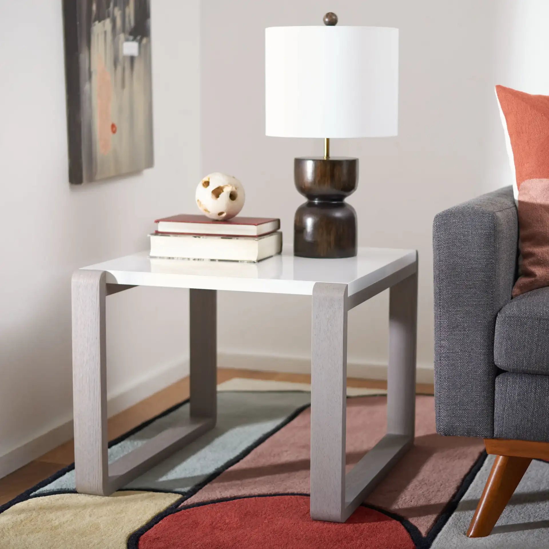 Bartholomew End Table in White / Dark Brown in a styled room