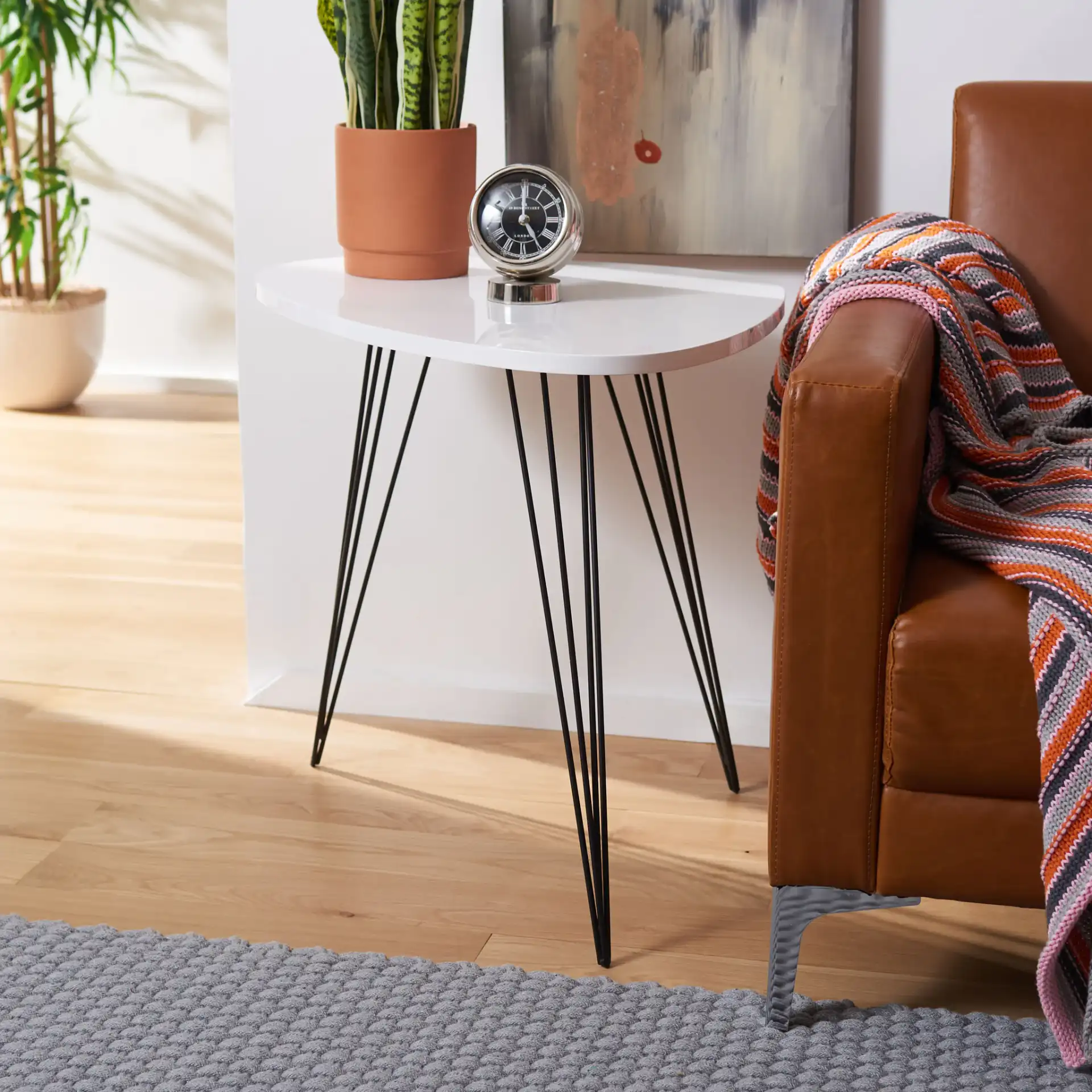 Wynton End Table in White / Black in a styled room