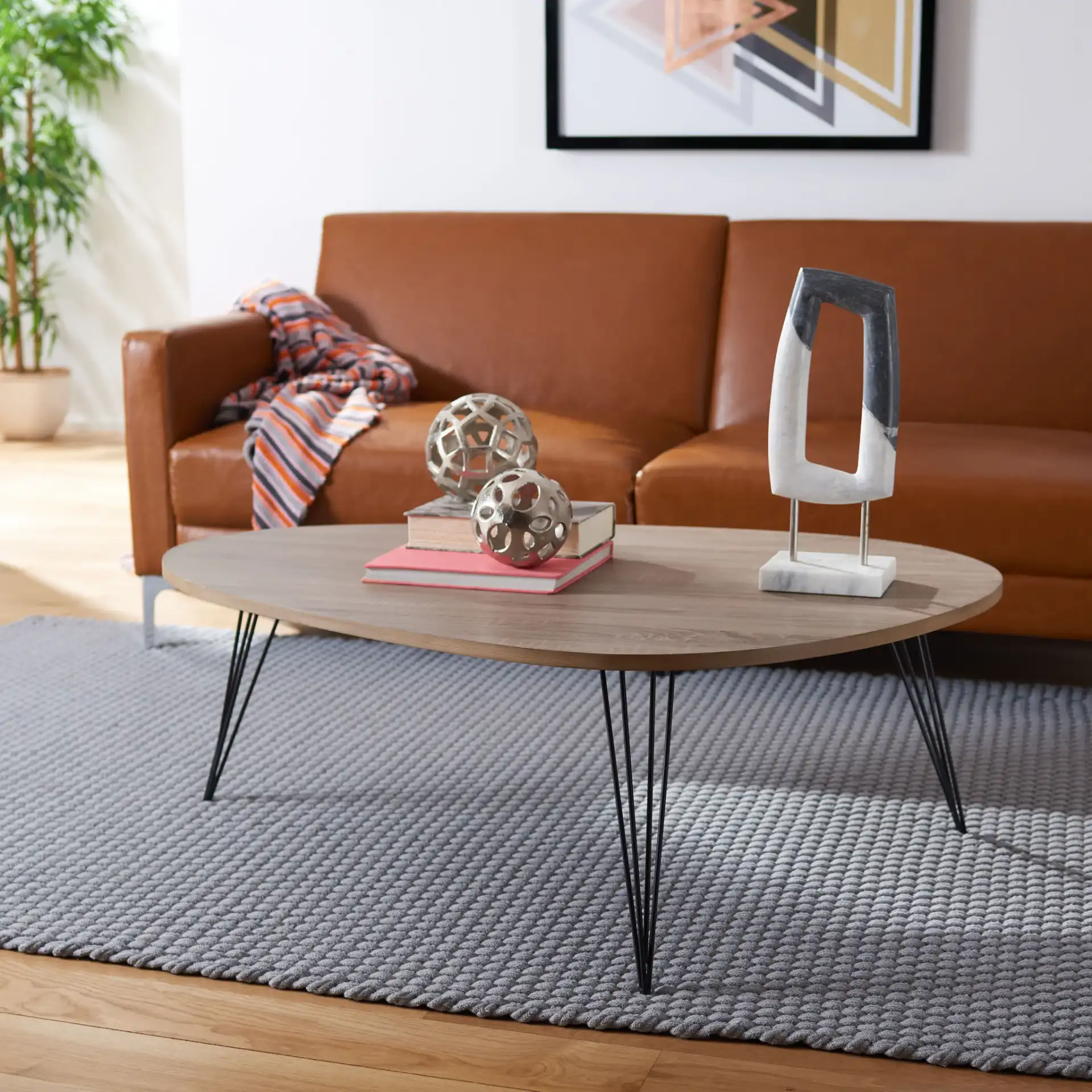 Wynton Coffee Table in Oak / Black in a styled room