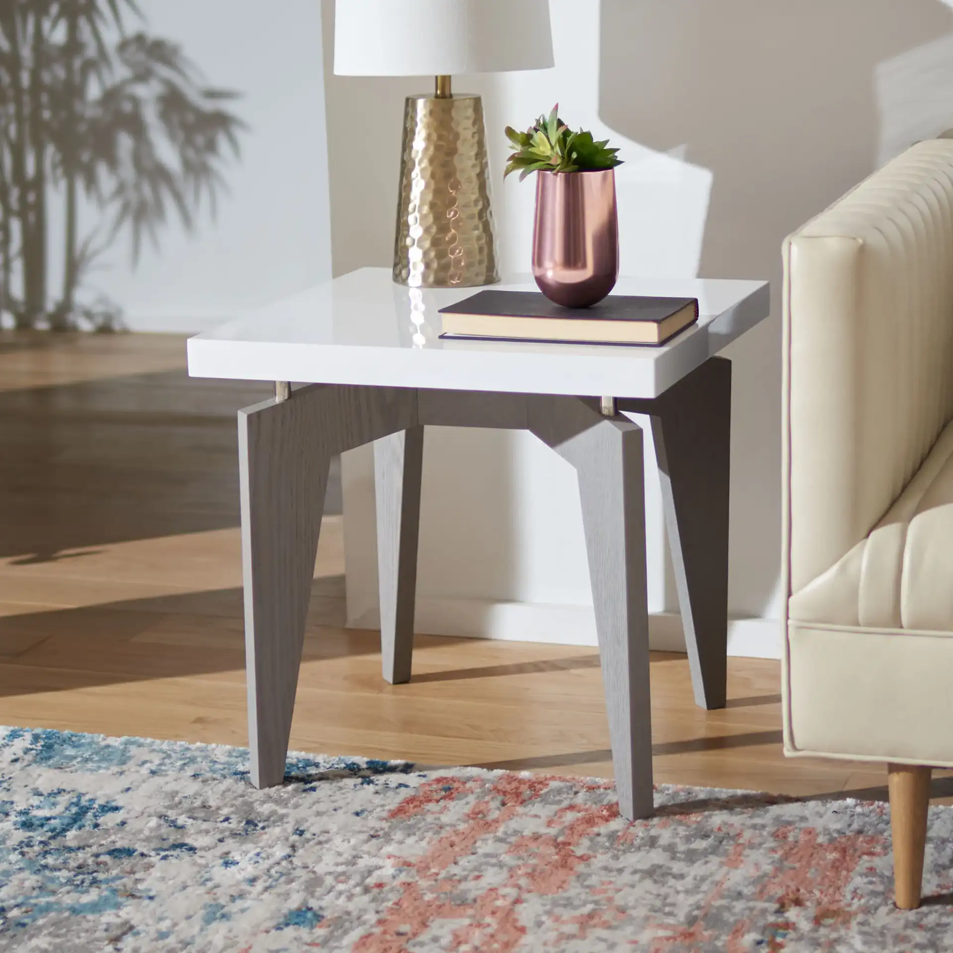 Josef End Table in White / Dark Brown in a styled room