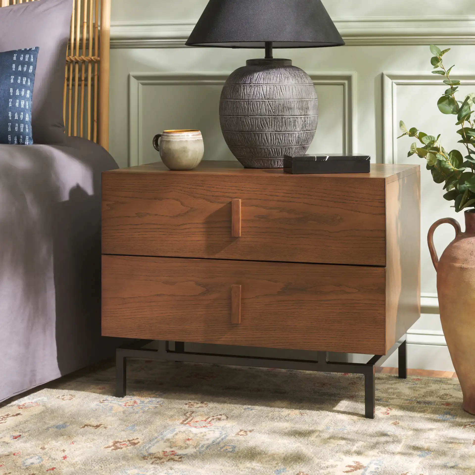 Herschel Cabinet in Dark Brown / Black in a styled room