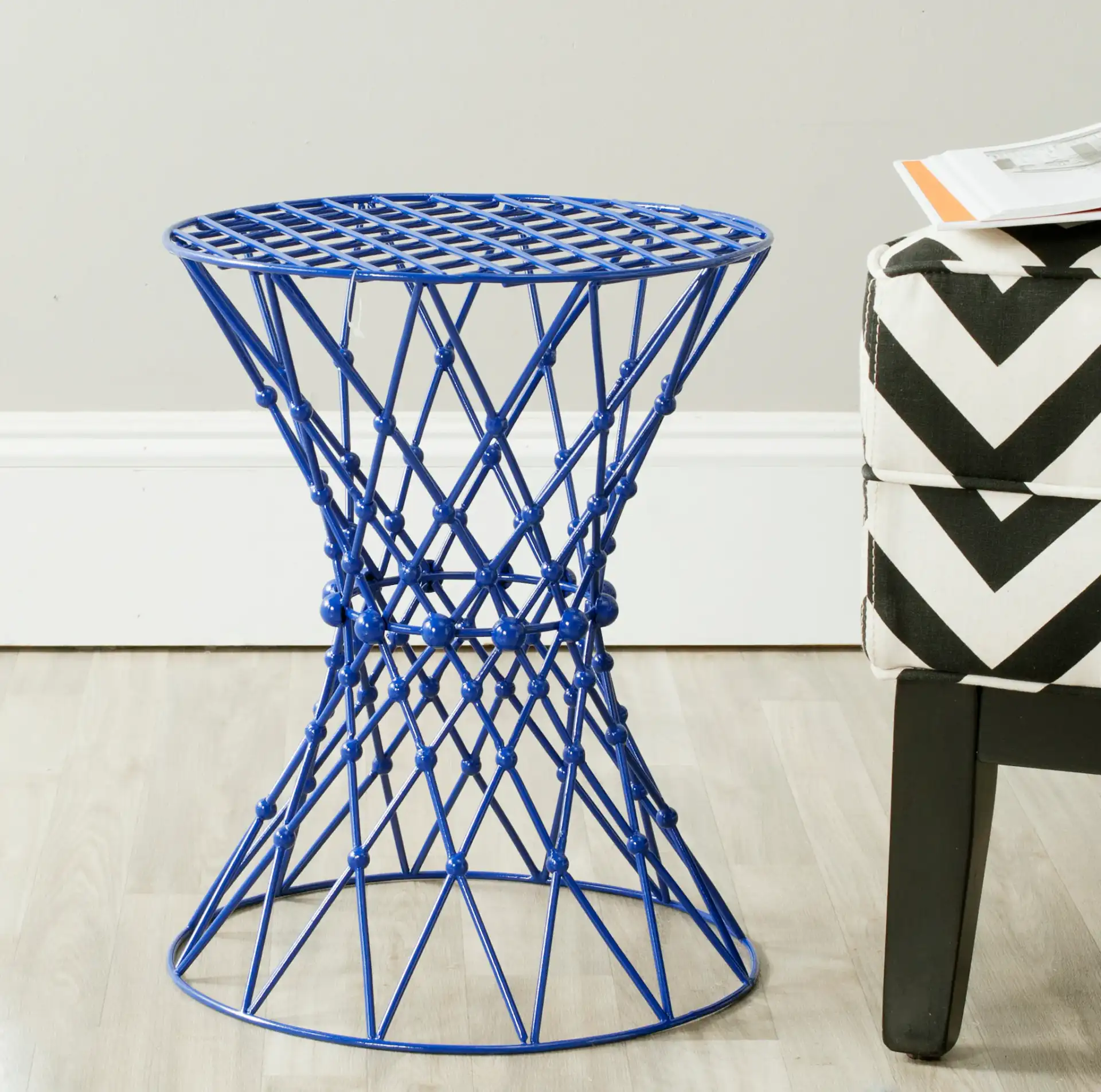 Iron Wire Stool in Dark Blue in a styled room