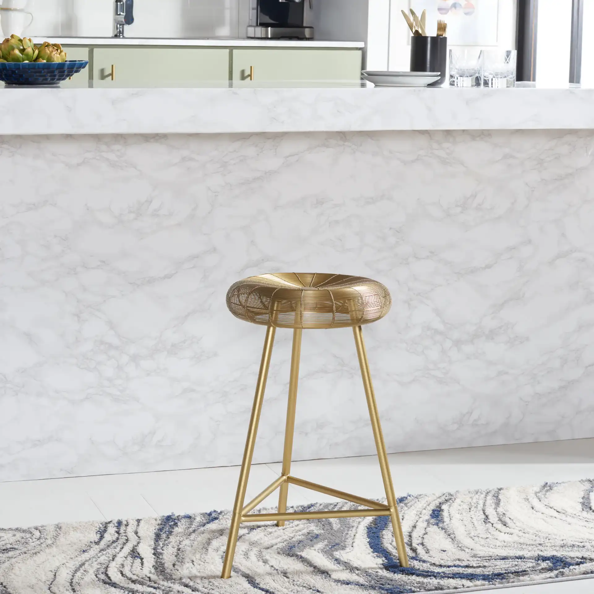 Addison Counterstool in Gold in a styled room
