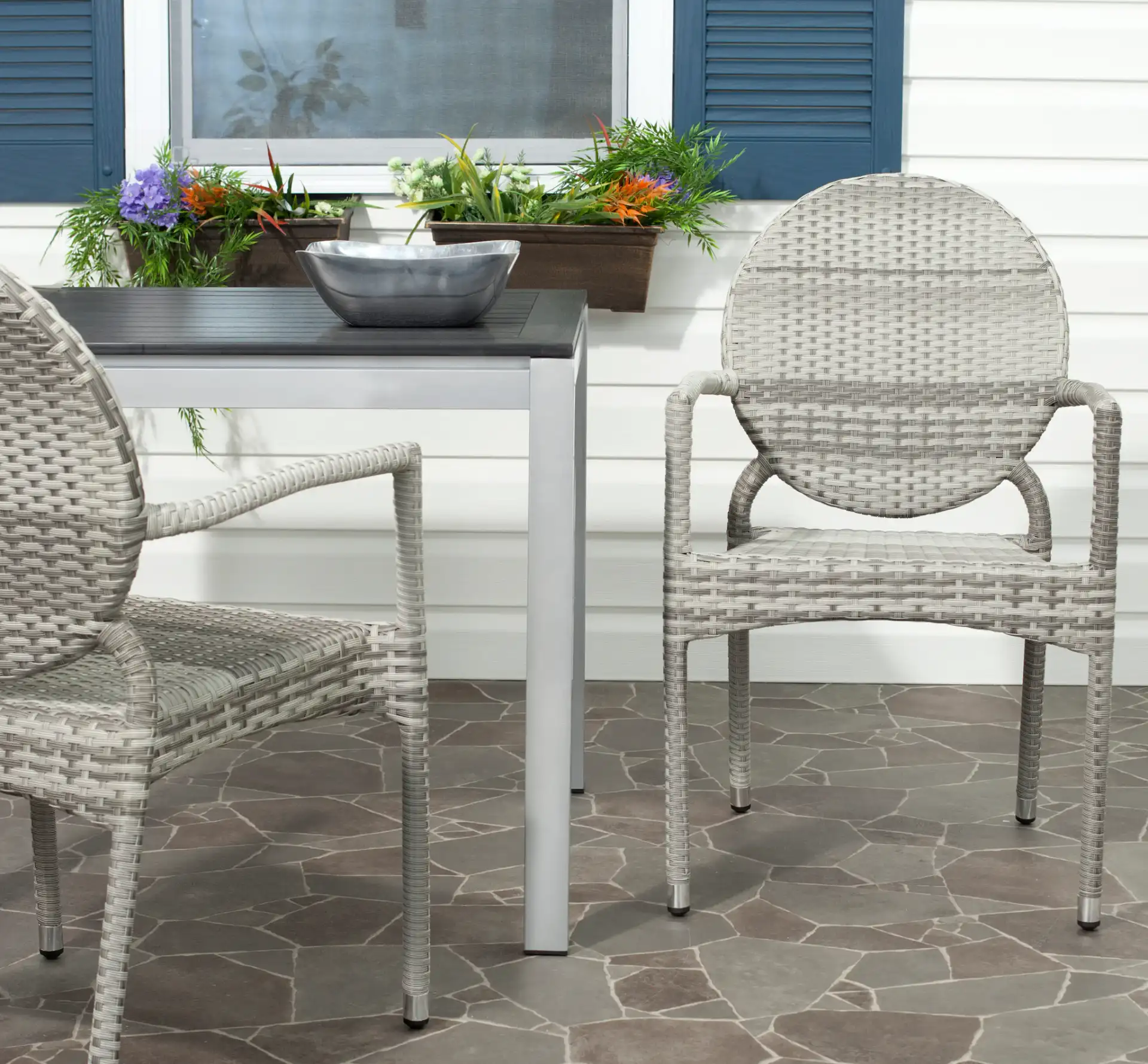 Valdez Stackable Arm Chair (Set of 2) in Gray in a styled room