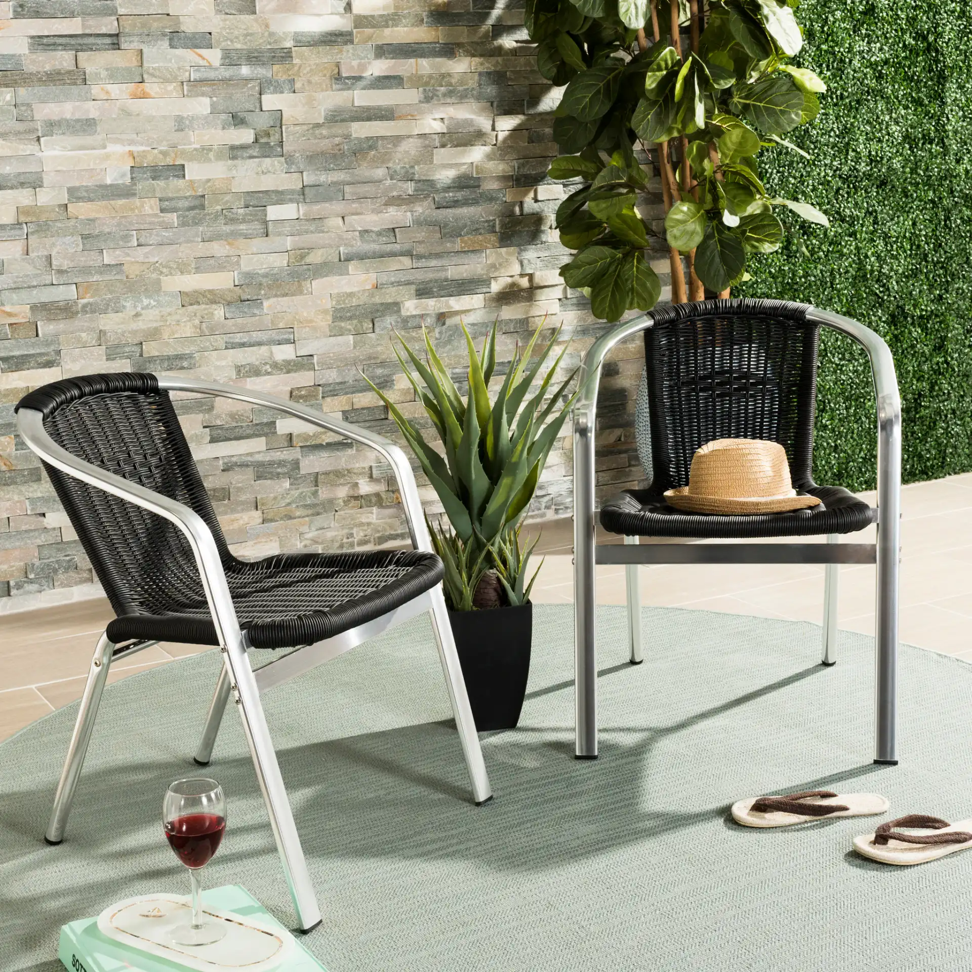 Wrangell Stackable Arm Chair (Set Of 2) in Black in a styled room