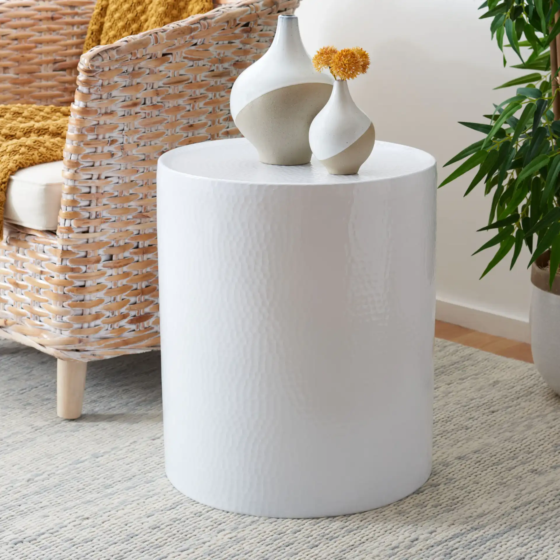 Polonium Accent Table in Silver in a styled room