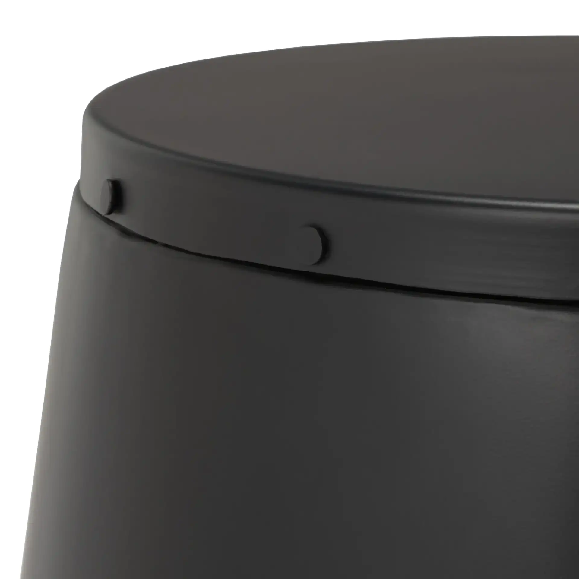 Hogan Drum Stool in Black in a styled room