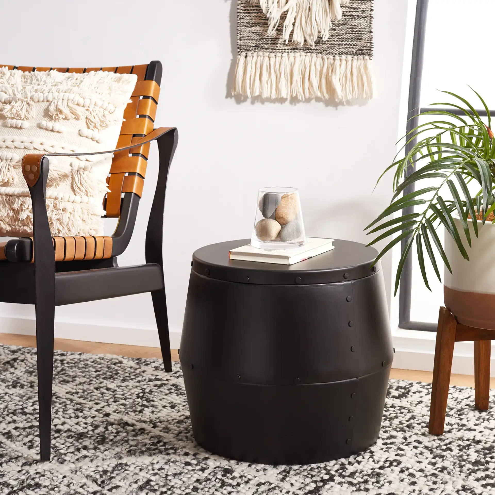 Hogan Drum Stool in Black in a styled room