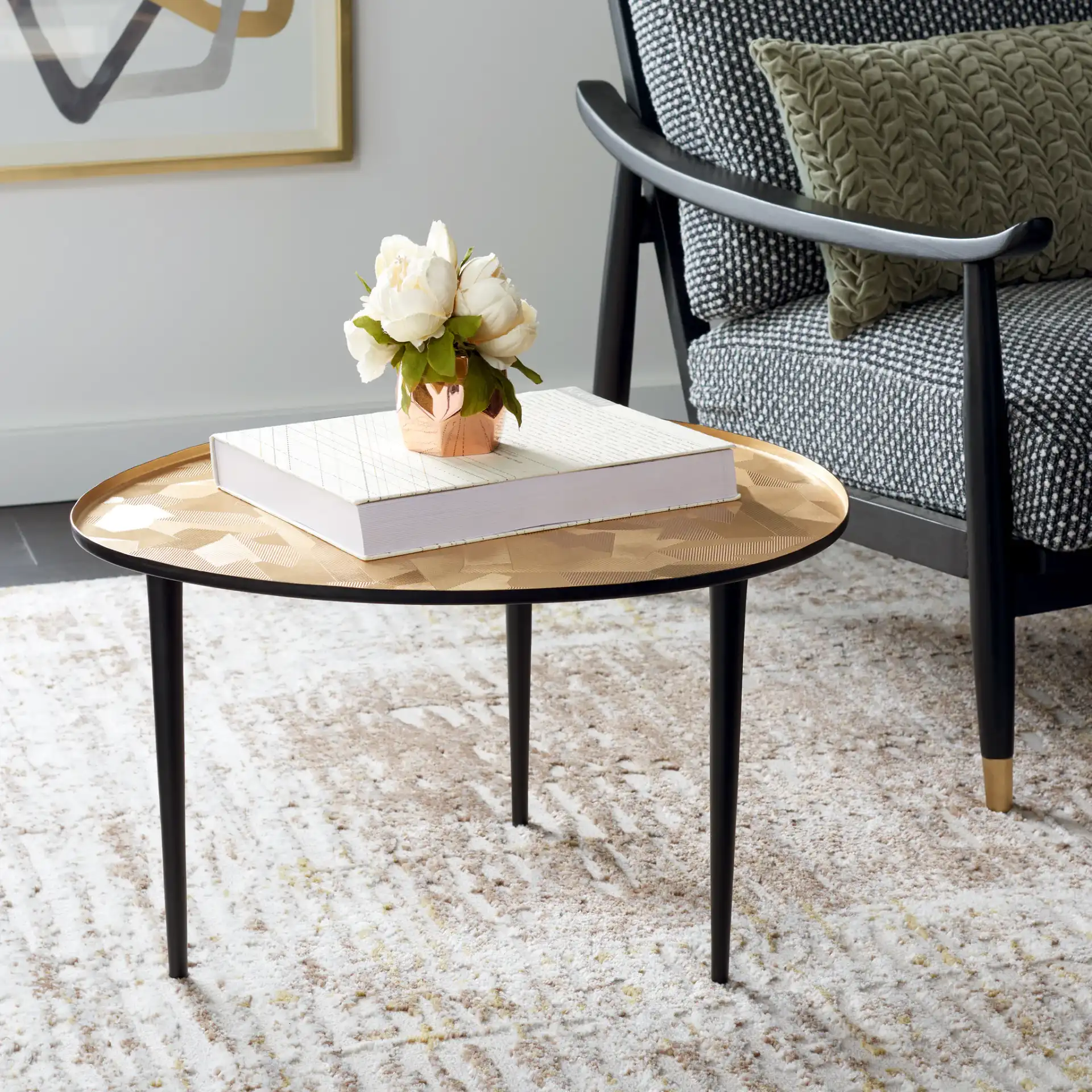 Hera Oval Side Table in Taupe / Black in a styled room