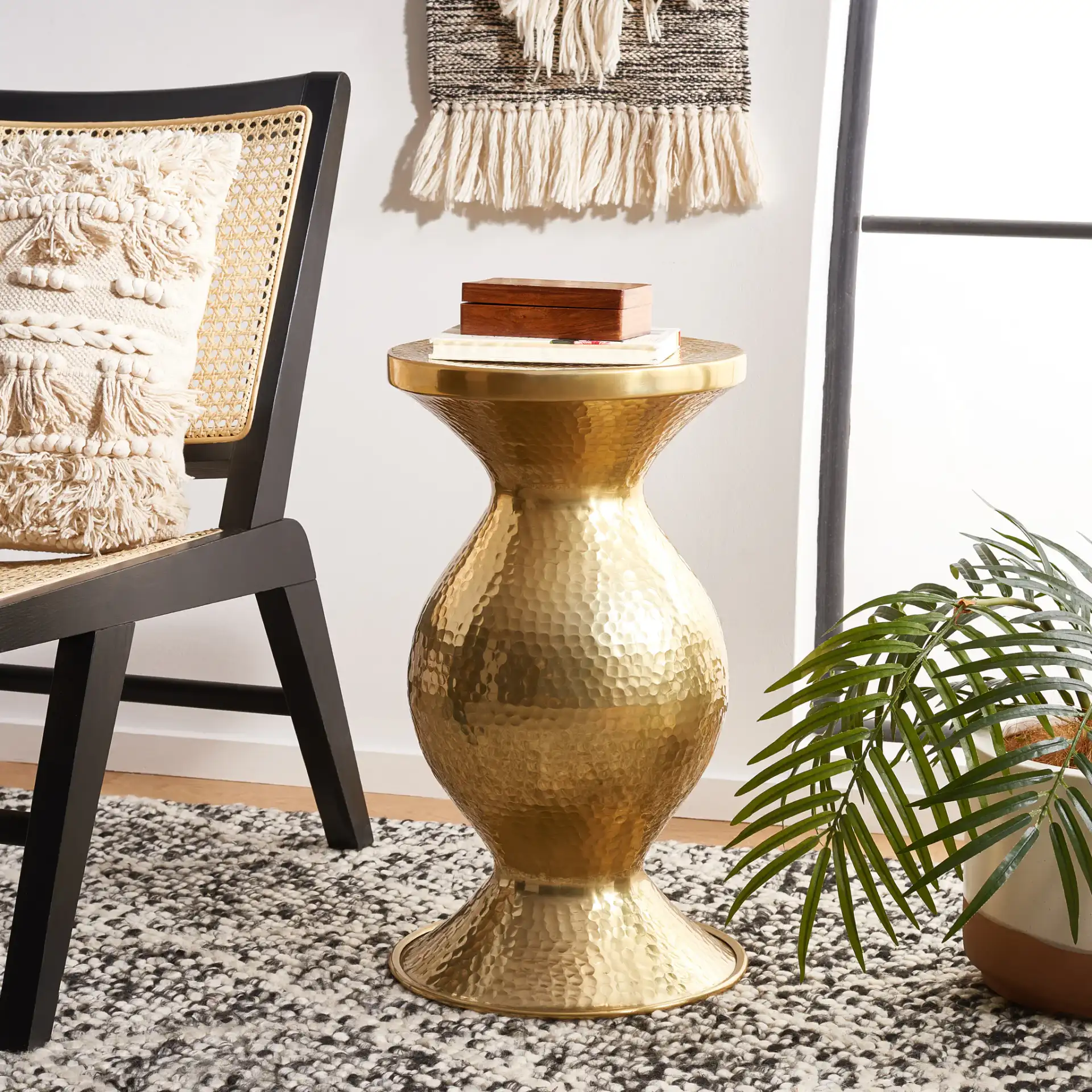 Janus Hammered Stool in Gold in a styled room