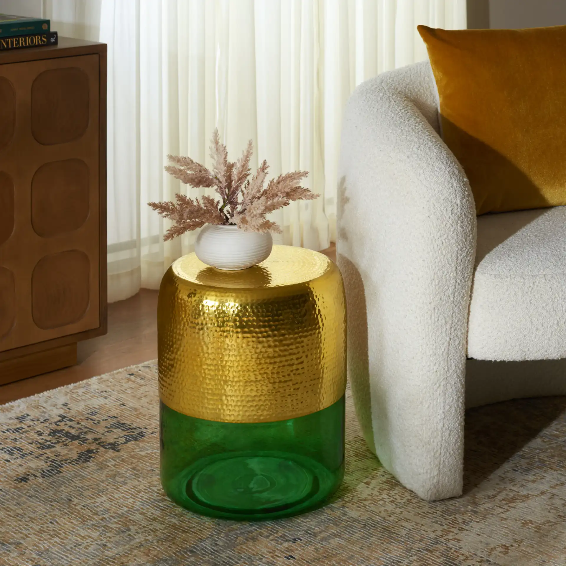 Saanvi Round Accent Table in Champagne Gold / Green in a styled room
