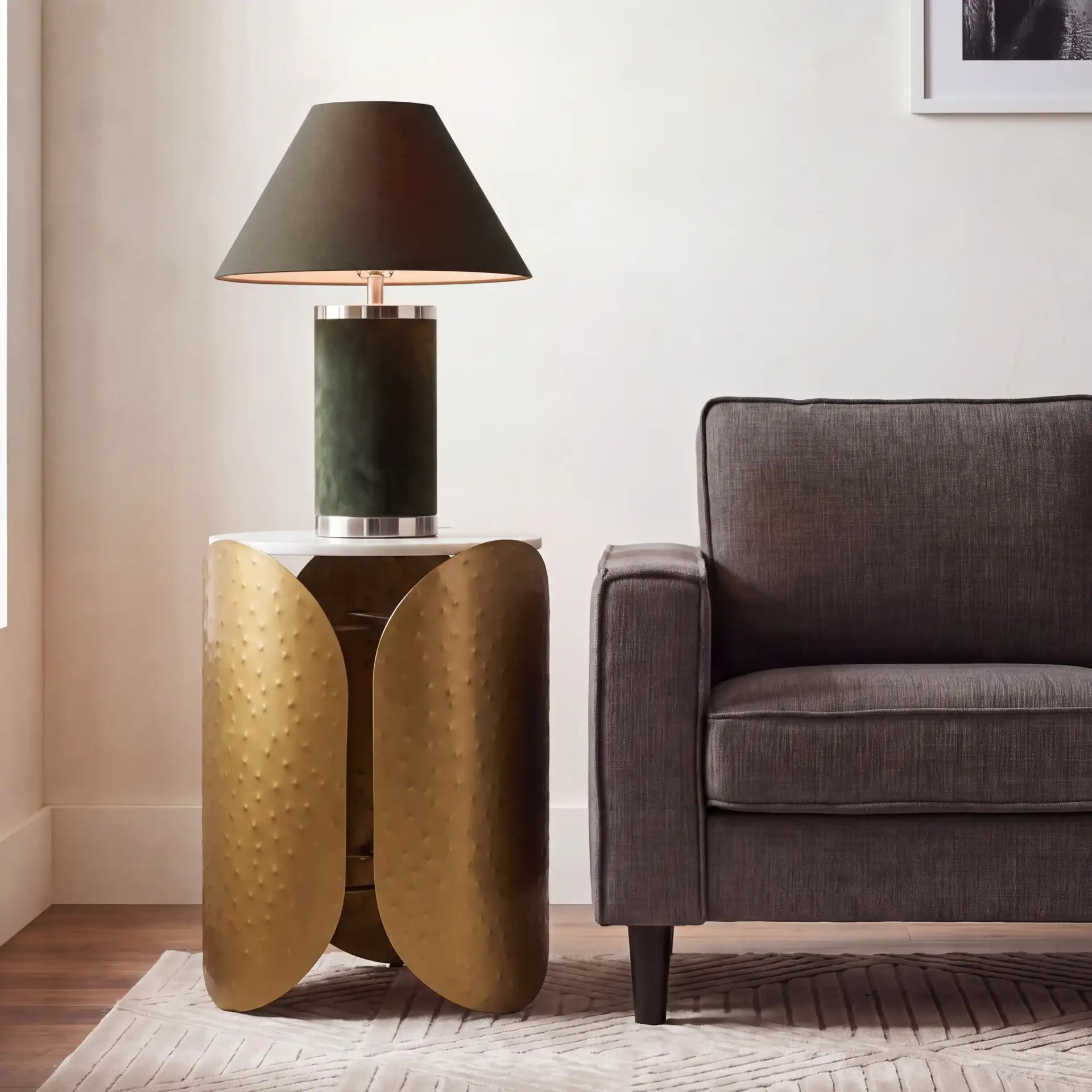 Shiara Round Accent Table in White Marble / Antique Brass in a styled room