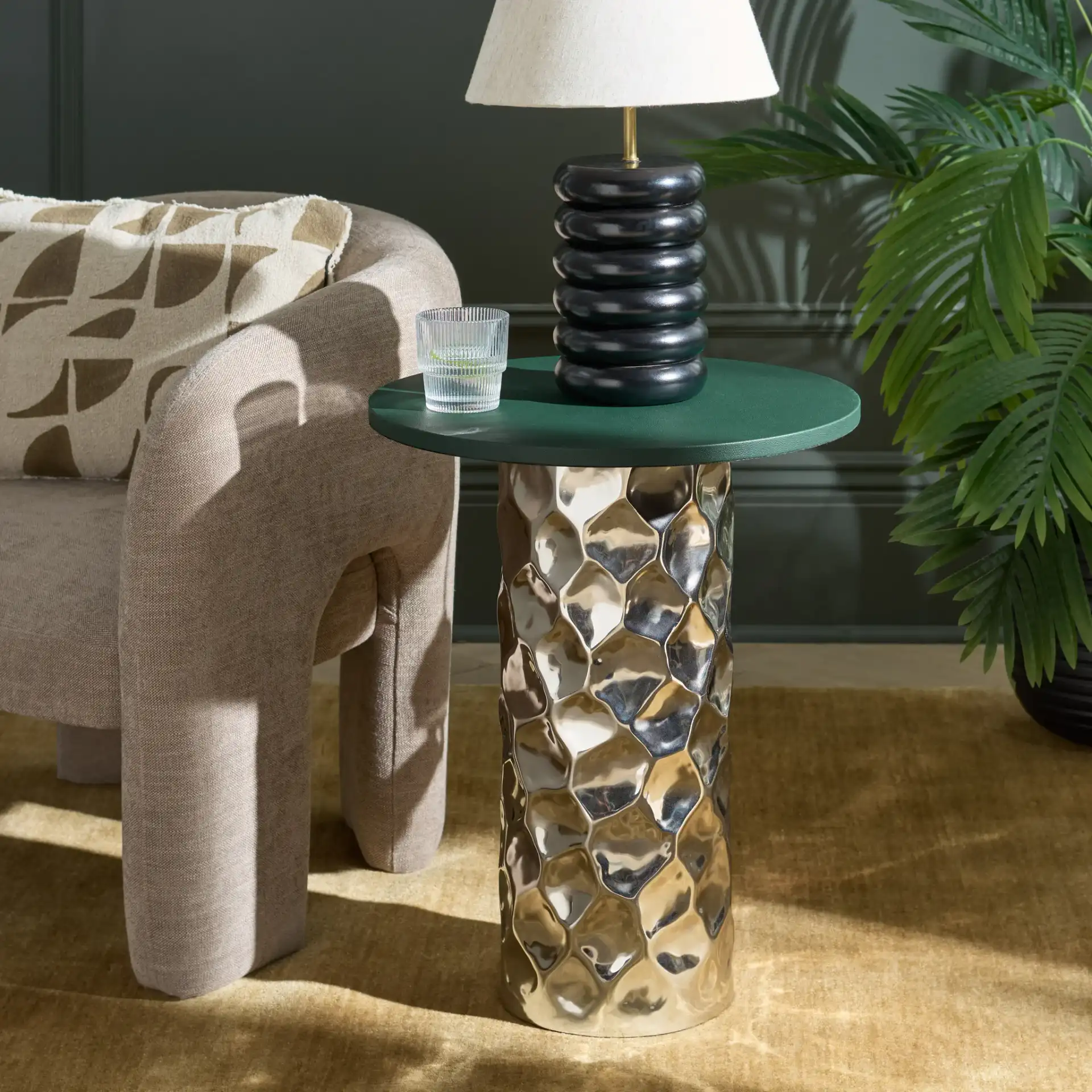 Hasu Round Side Table in Green / Silver in a styled room