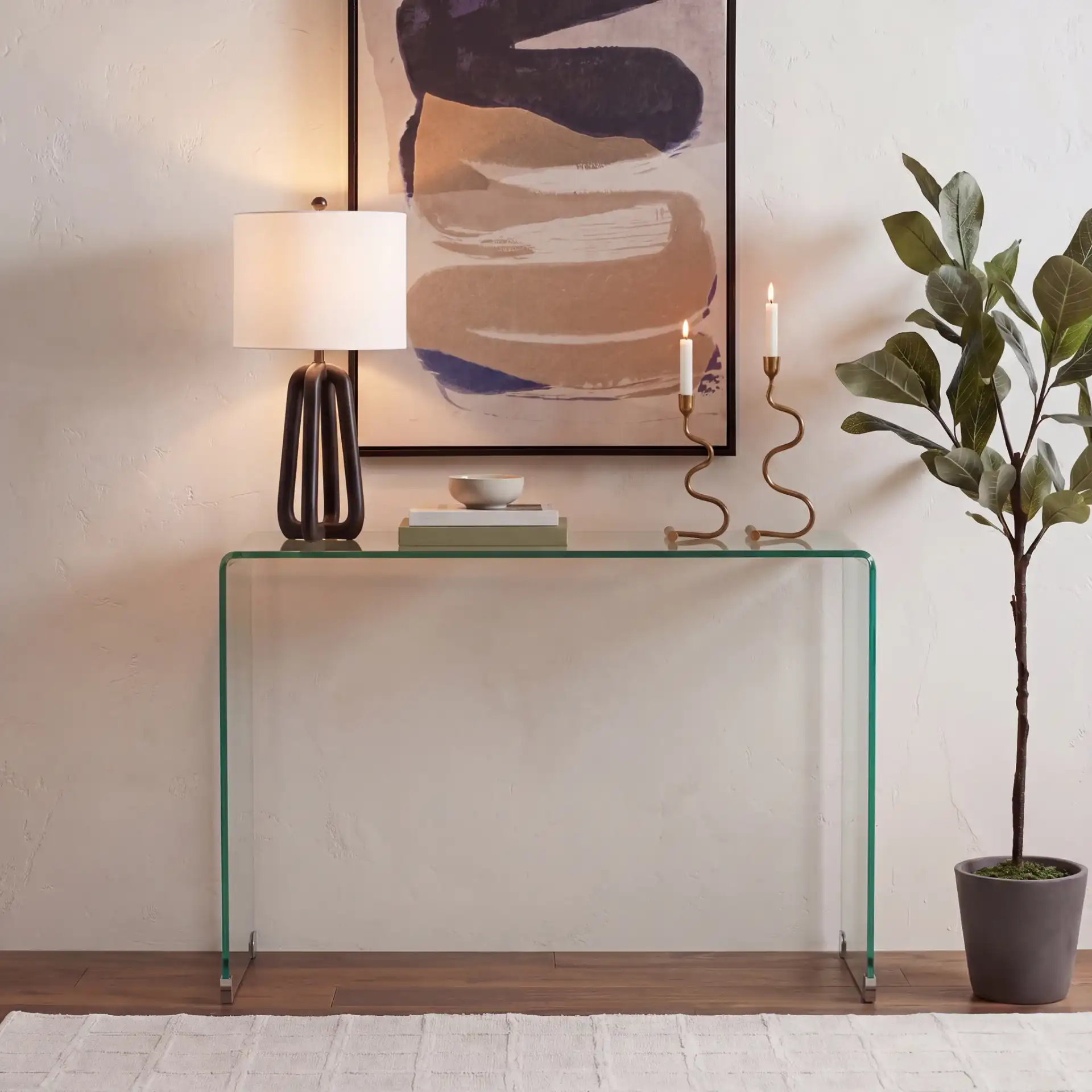 Ambler Glass Console Table in Clear in a styled room