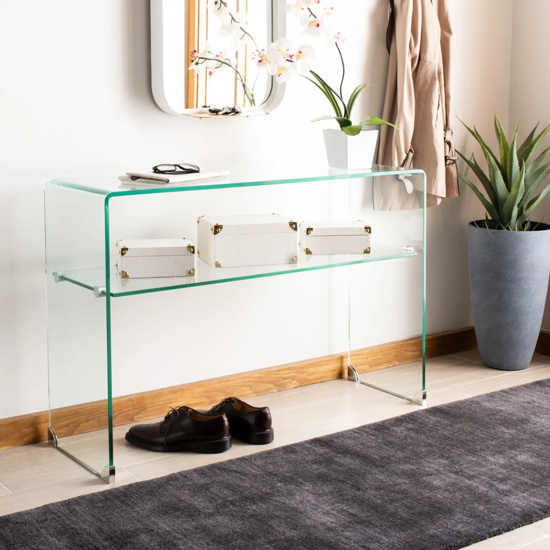 Hollis Glass Console Table in Clear in a styled room
