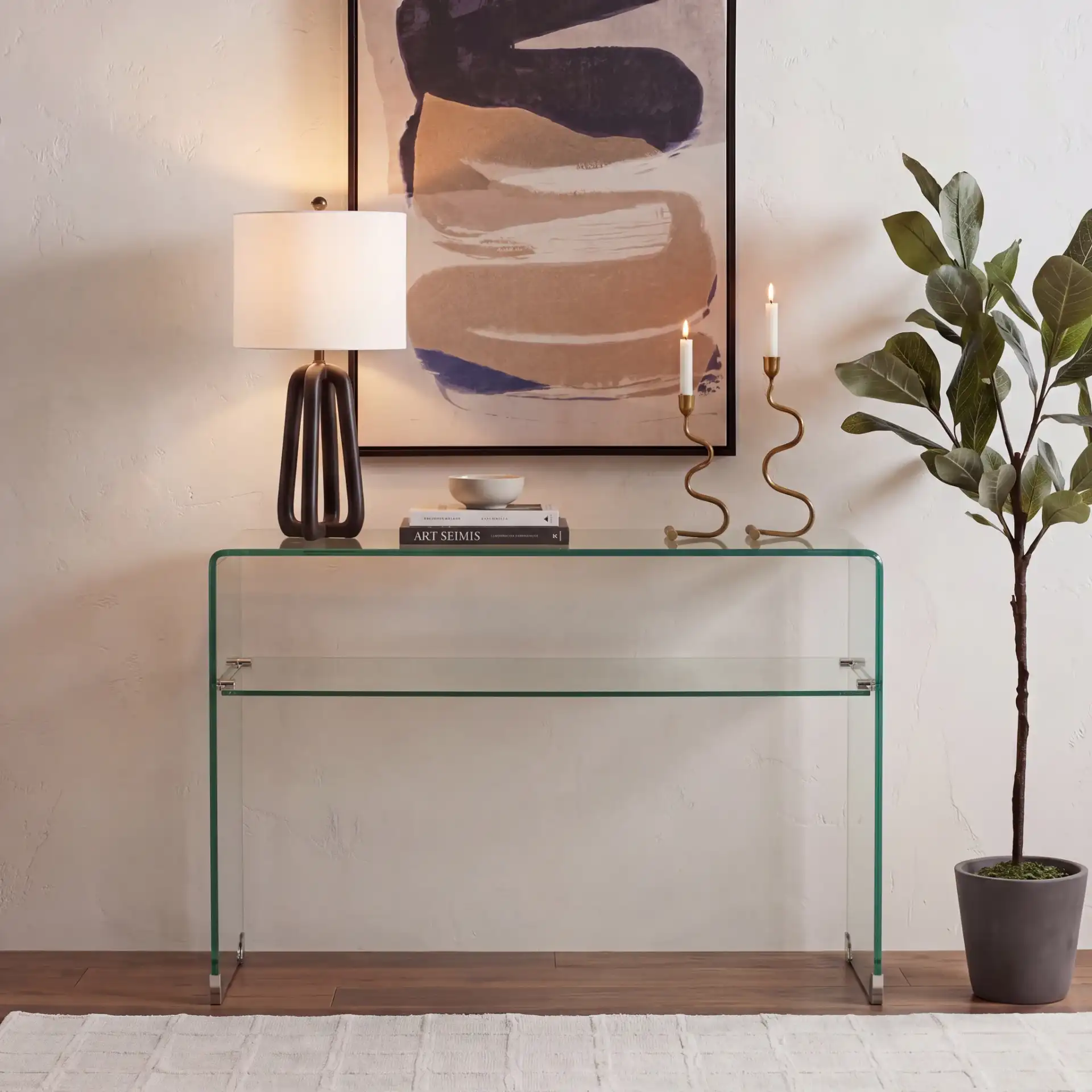 Hollis Glass Console Table in Clear in a styled room