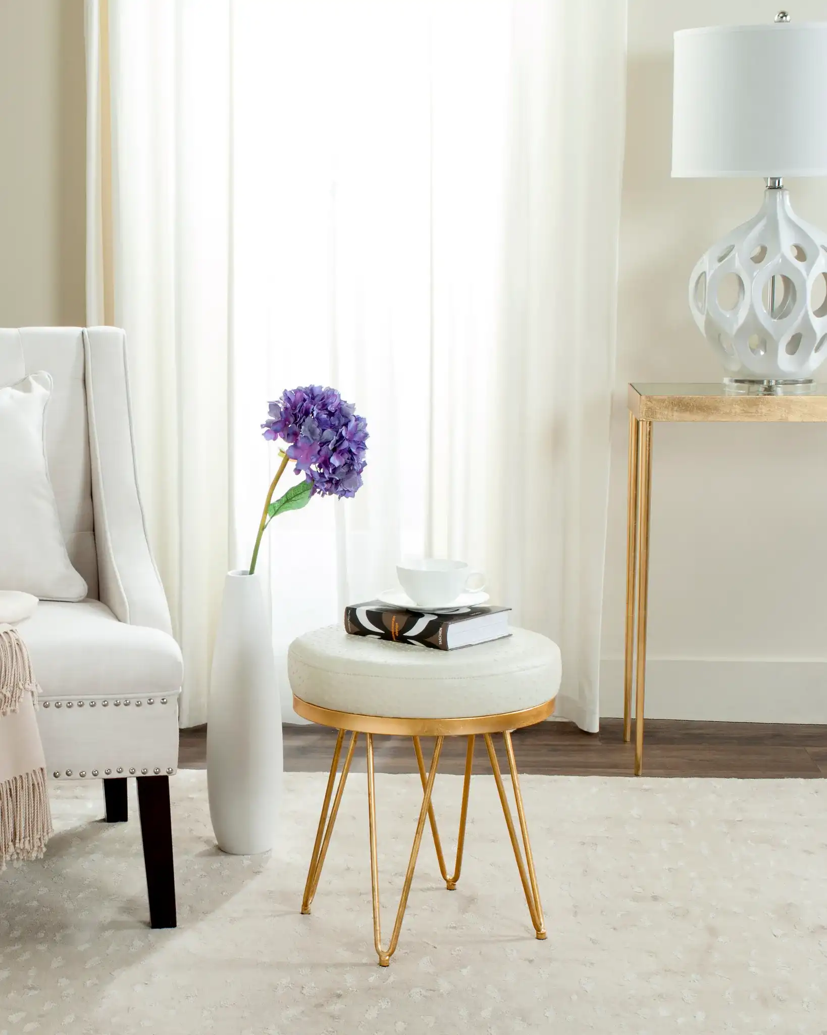 Jenine Round Bench in Cream / Gold in a styled room