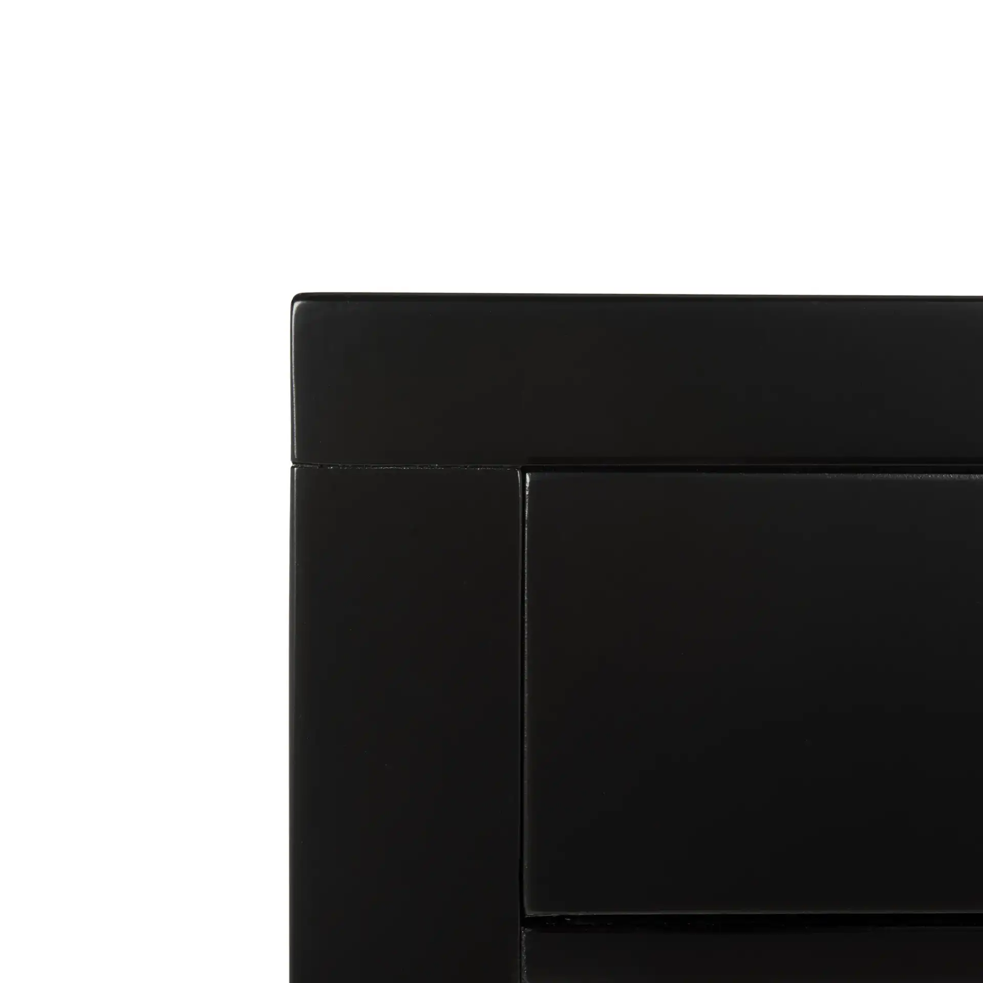 Nero Three-Drawer Nightstand in Black in a styled room