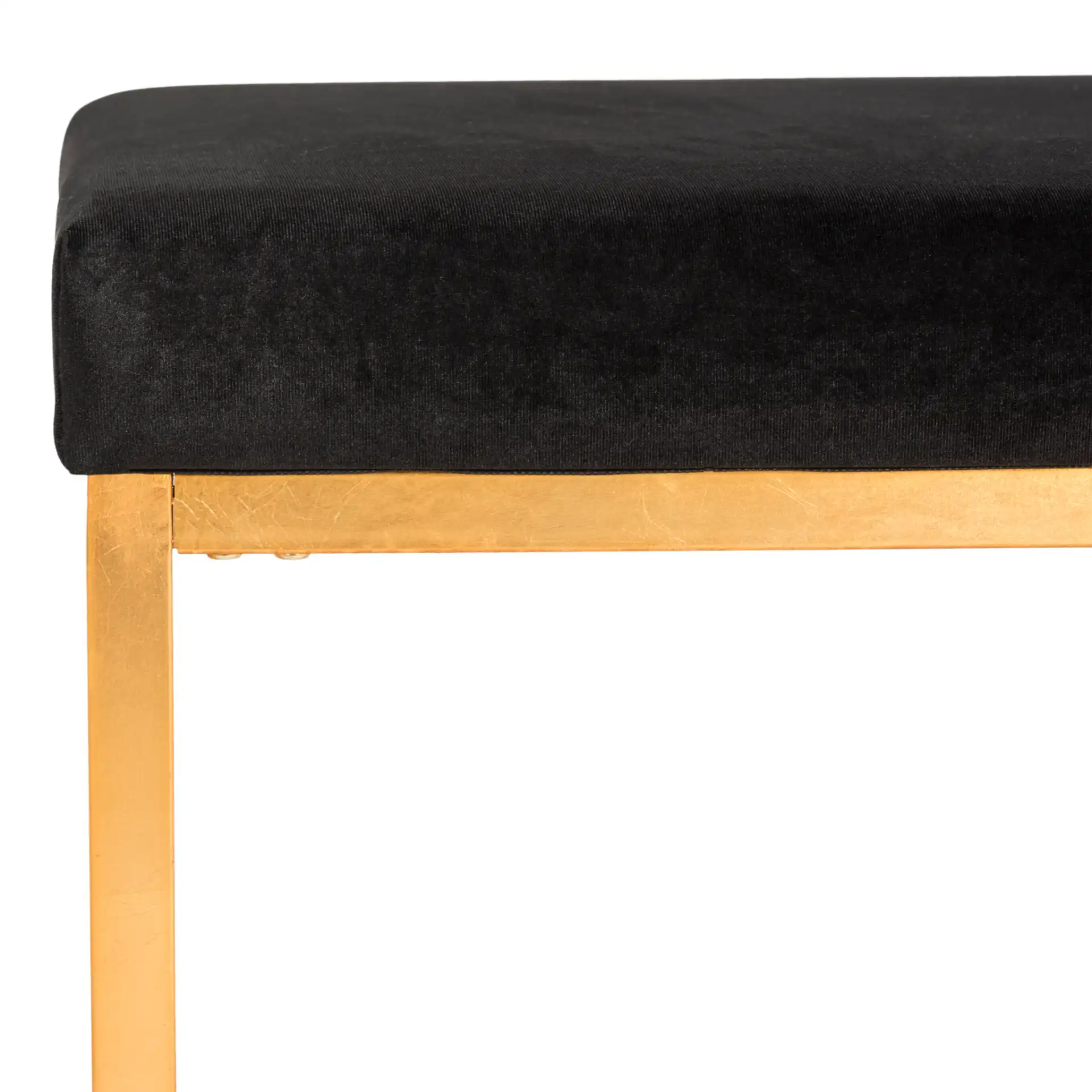 Rowan Square Ottoman in Black / Gold in a styled room