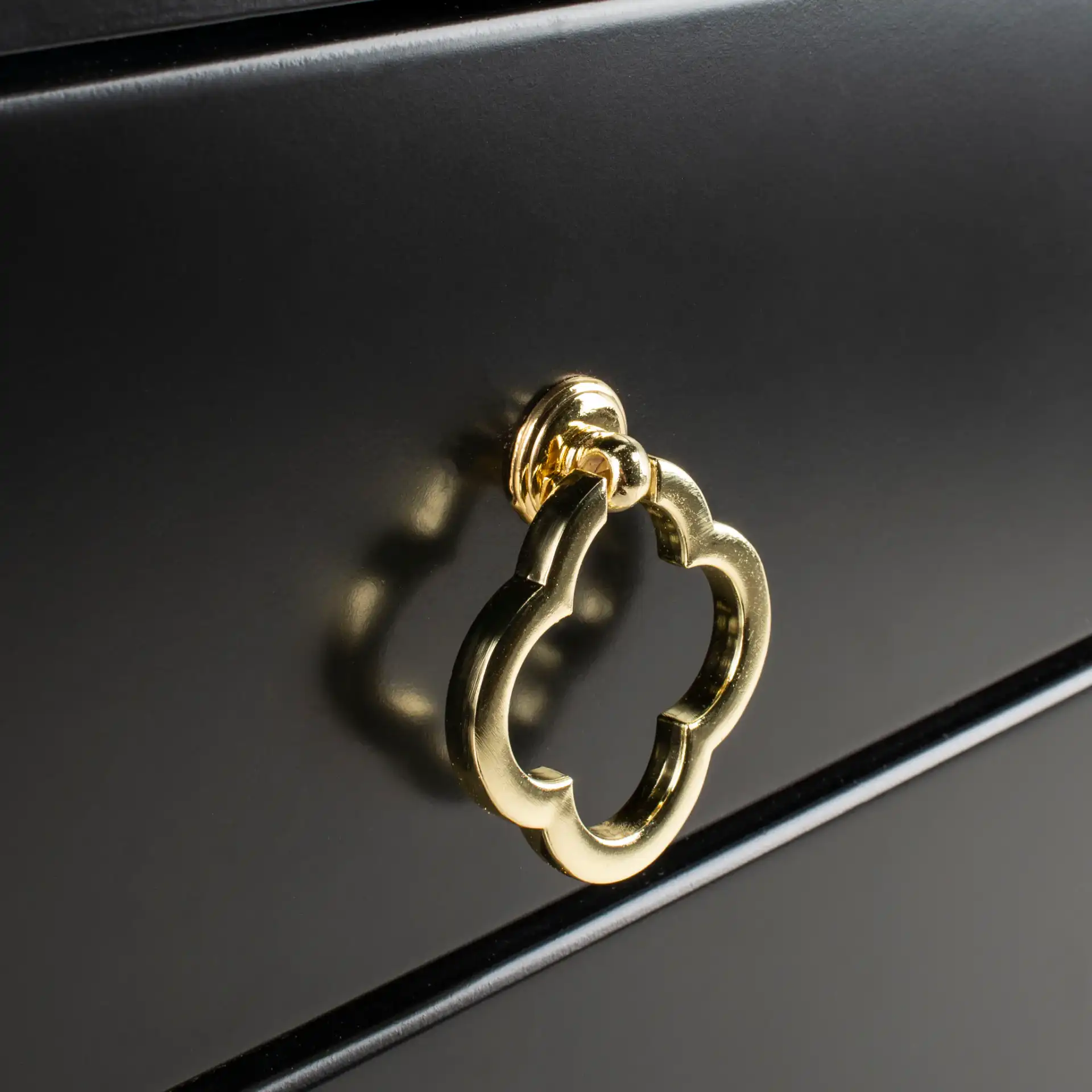 Hannon Nightstand in Black / Brass in a styled room
