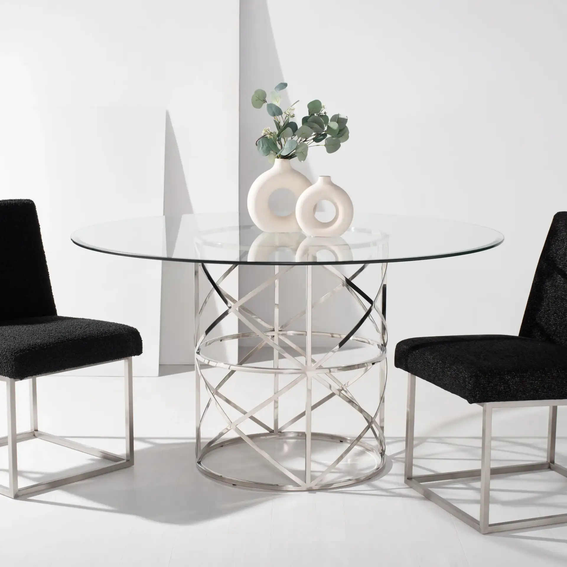 Ren 54" Glass Top Dining Table in Chrome in a styled room
