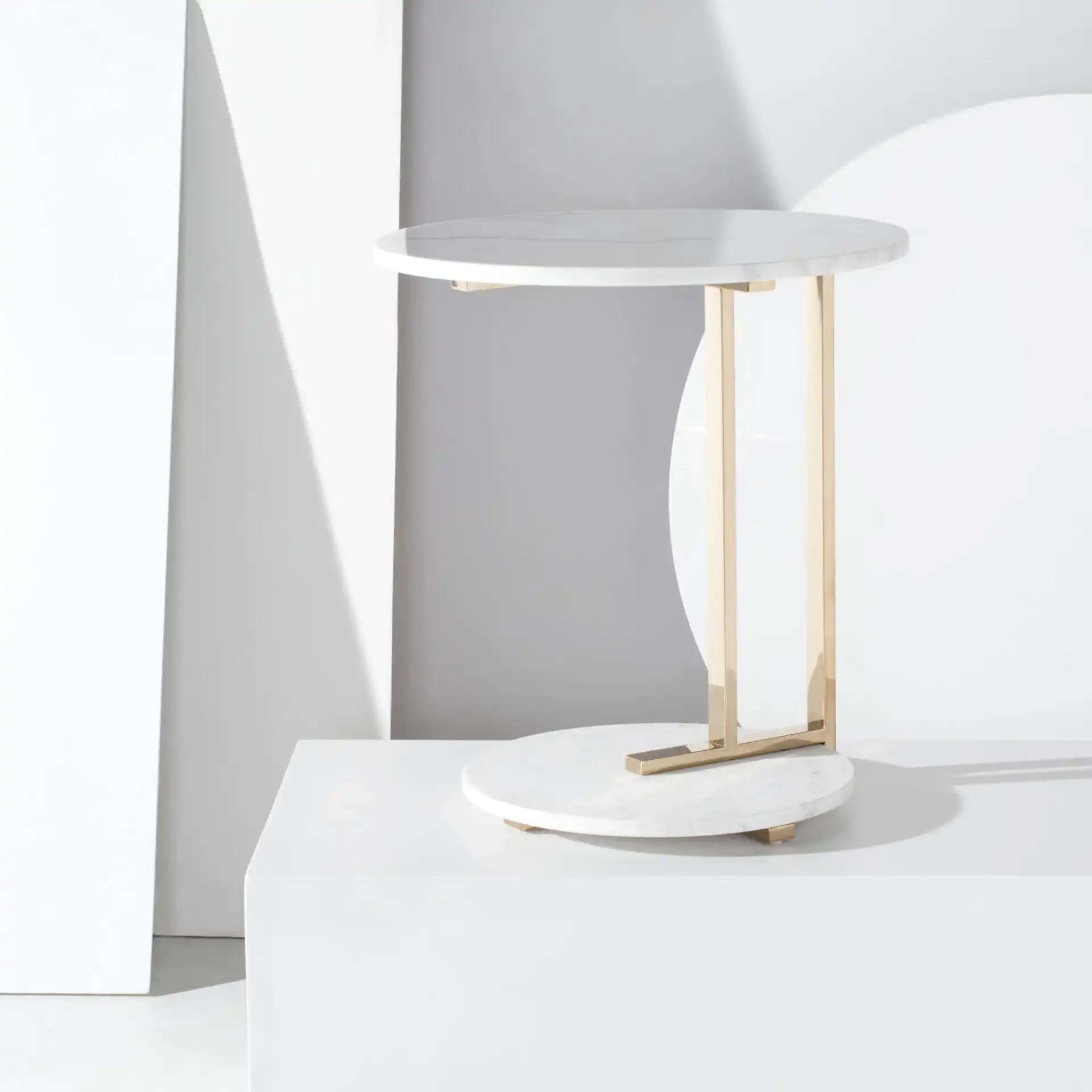 Aphrodite Marble End Table in Gold / White in a styled room