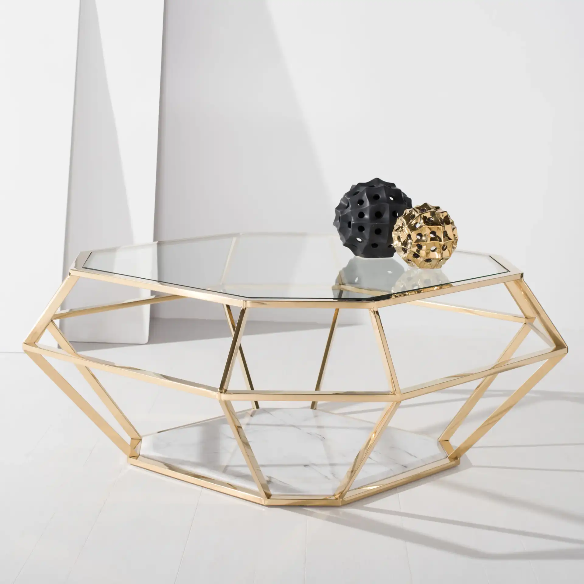 Abena Geometric Coffee Table in Gold in a styled room