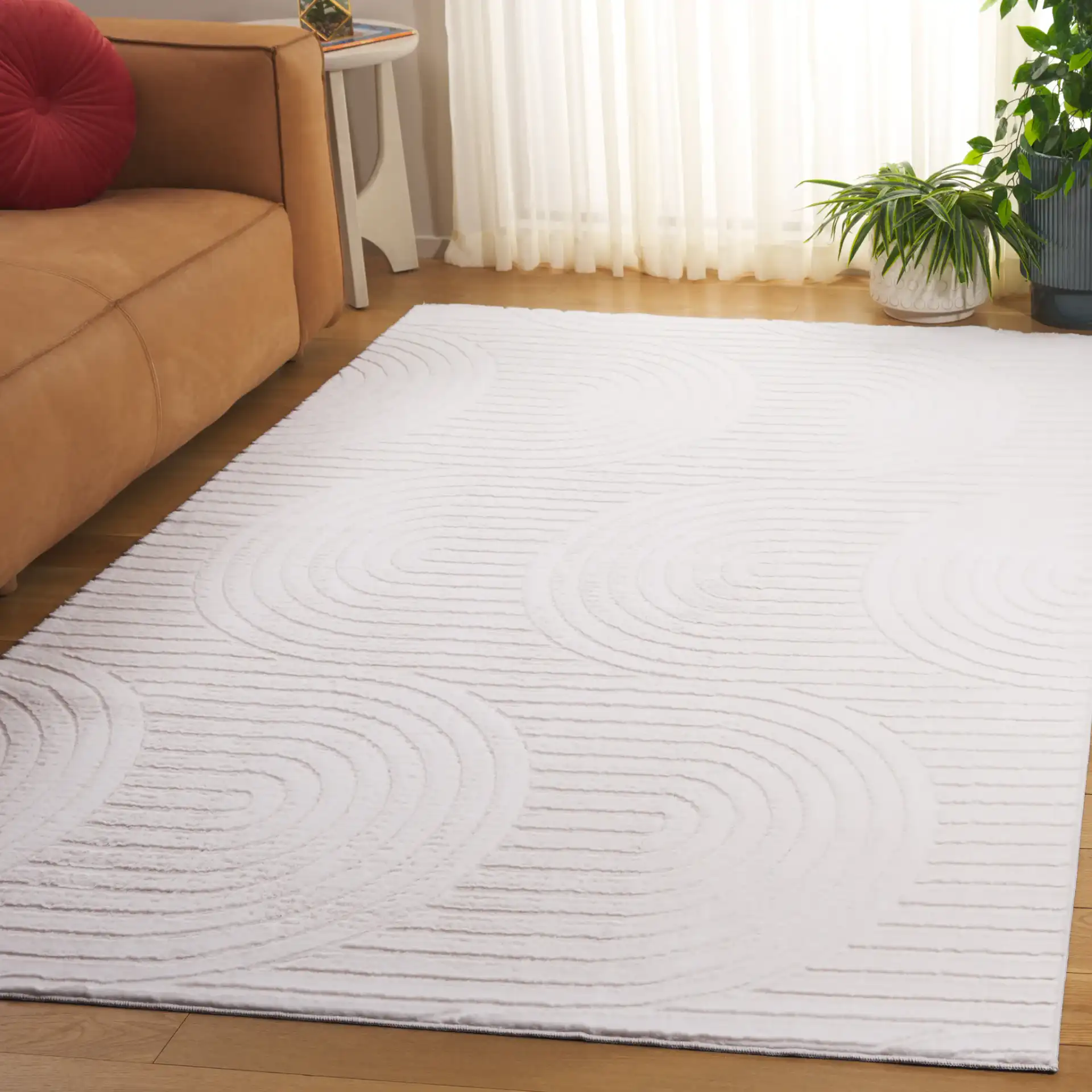 Faux Rabbit Fur Concentric Arches Washable Rug in Ivory in a styled room